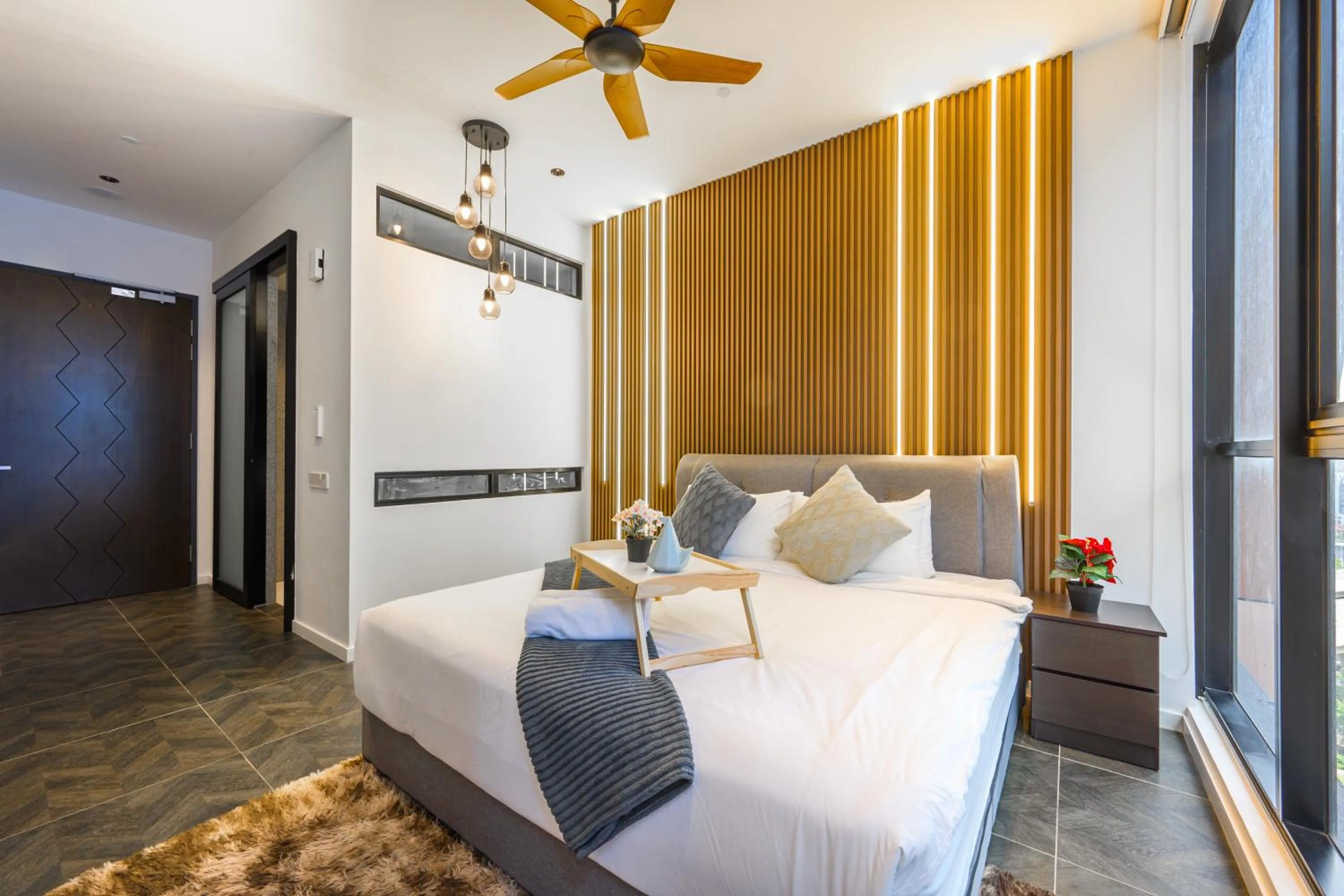 Bed in Greystone Scarletz Suites