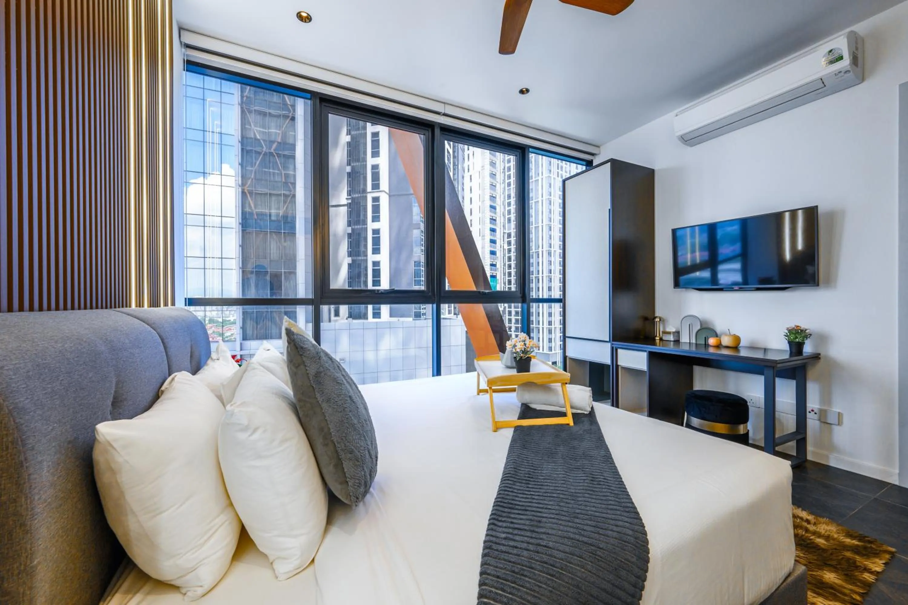 Bed in Greystone Scarletz Suites