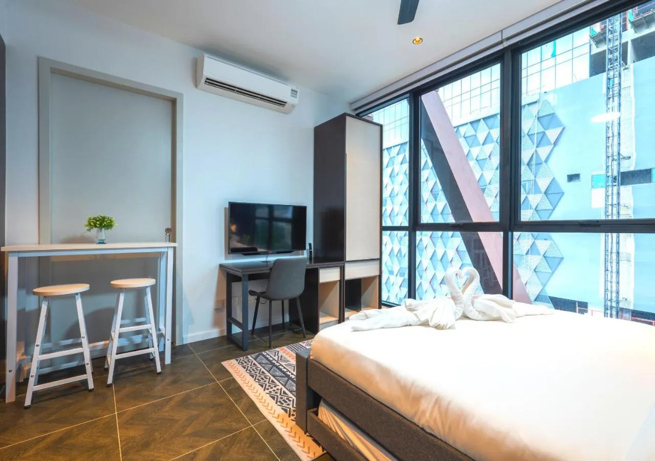 Dining area, Bed in Greystone Scarletz Suites