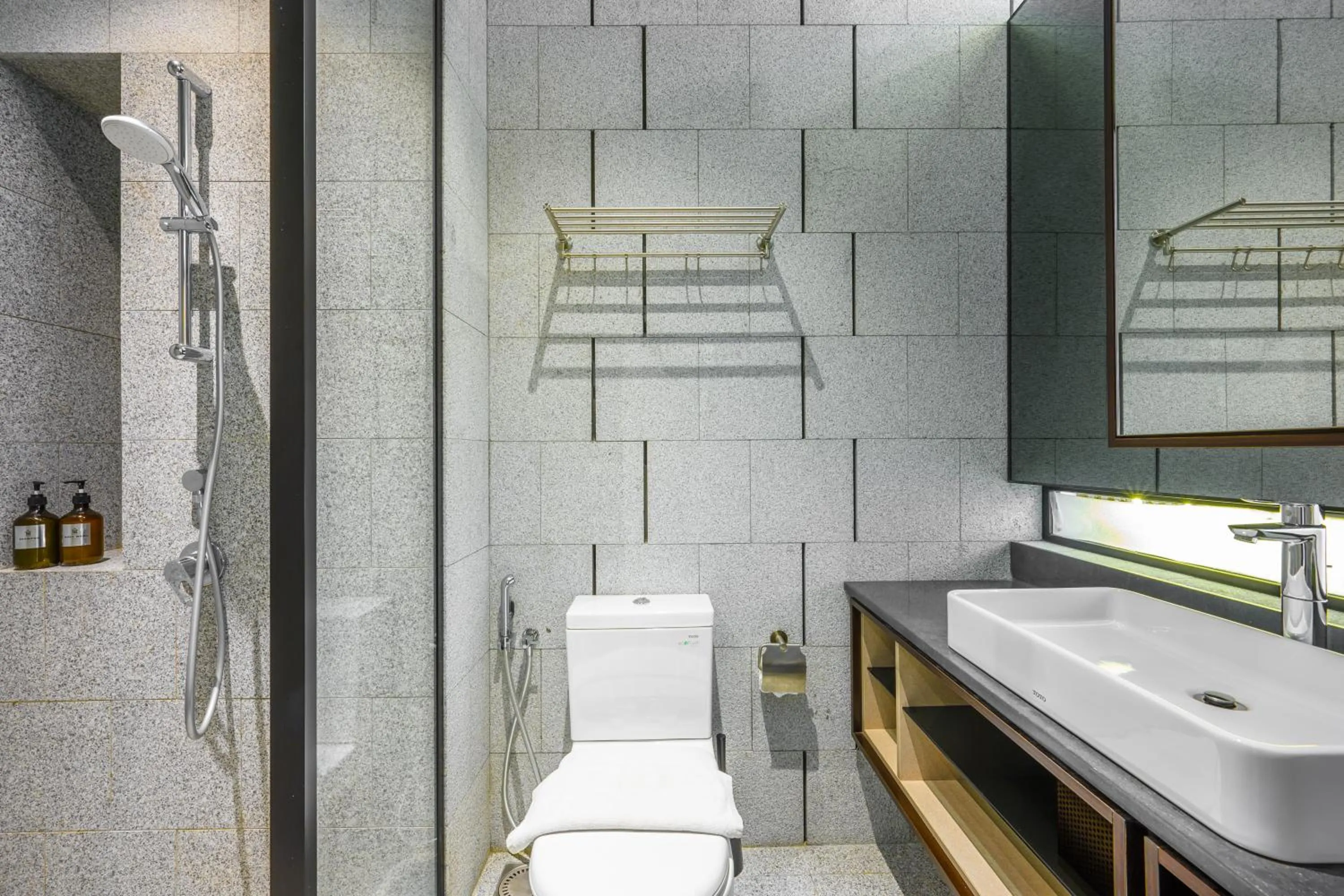 Shower in Greystone Scarletz Suites