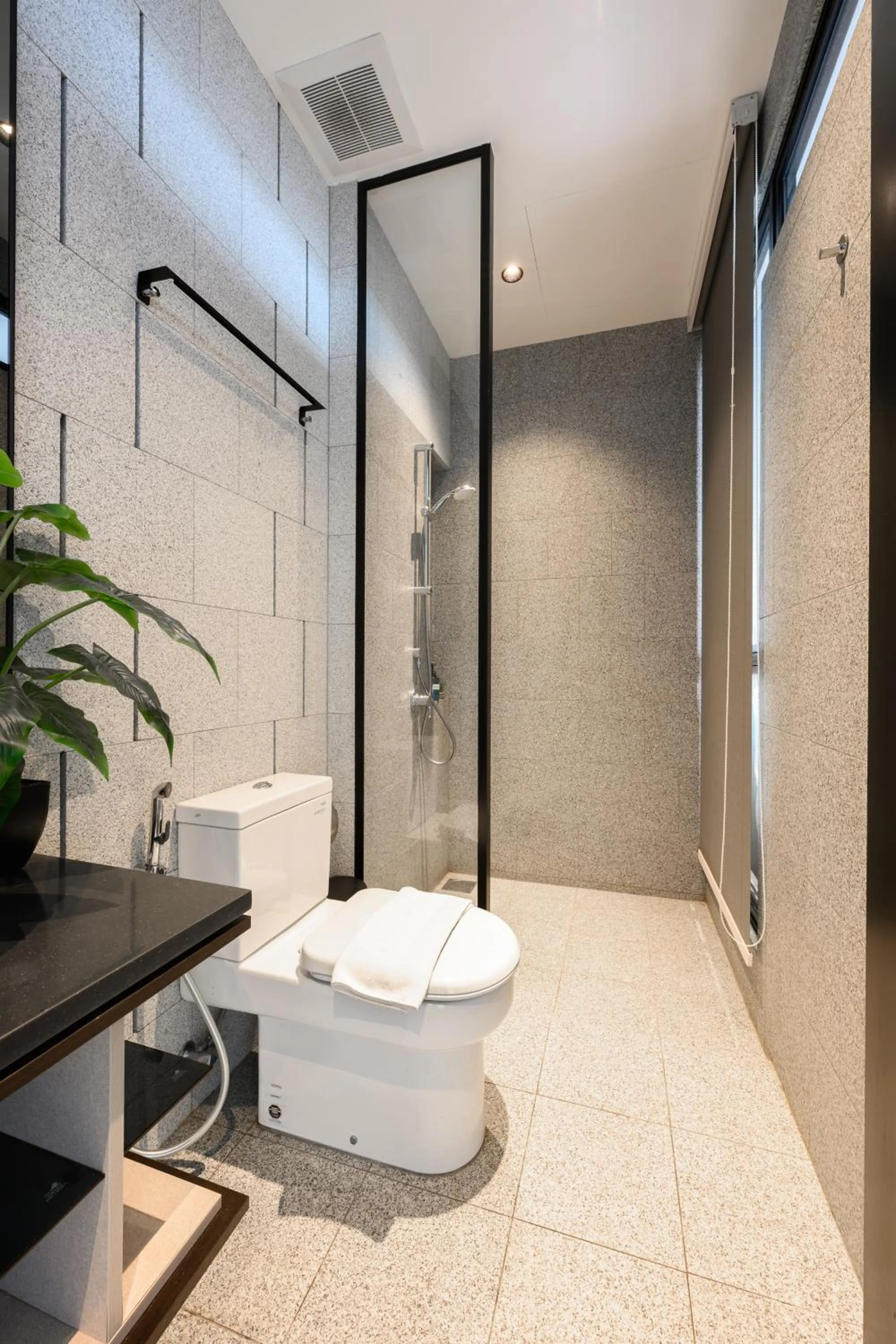 Shower in Greystone Scarletz Suites