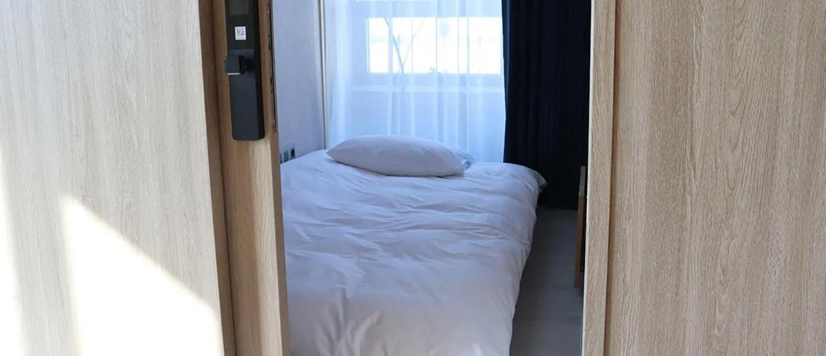 Bed in Hotel tt Gupo