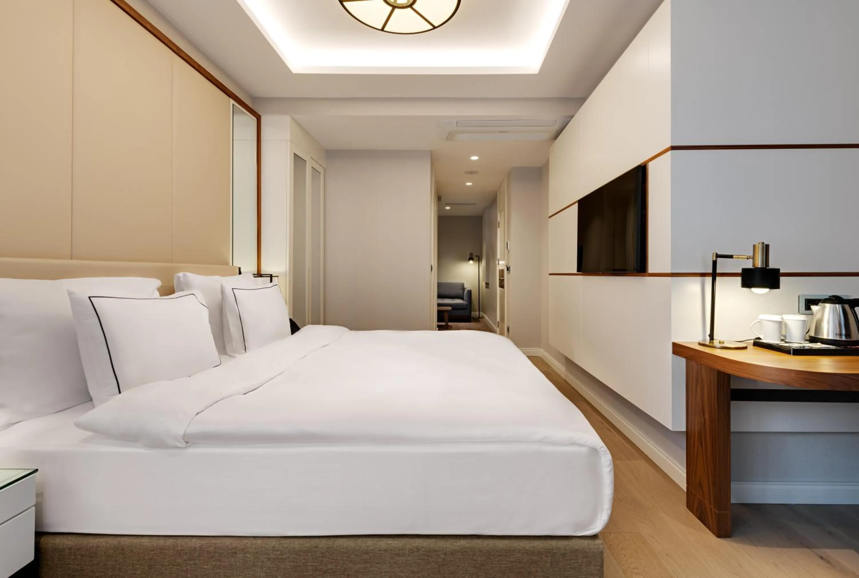 Bed in Gleam Collection Hotel