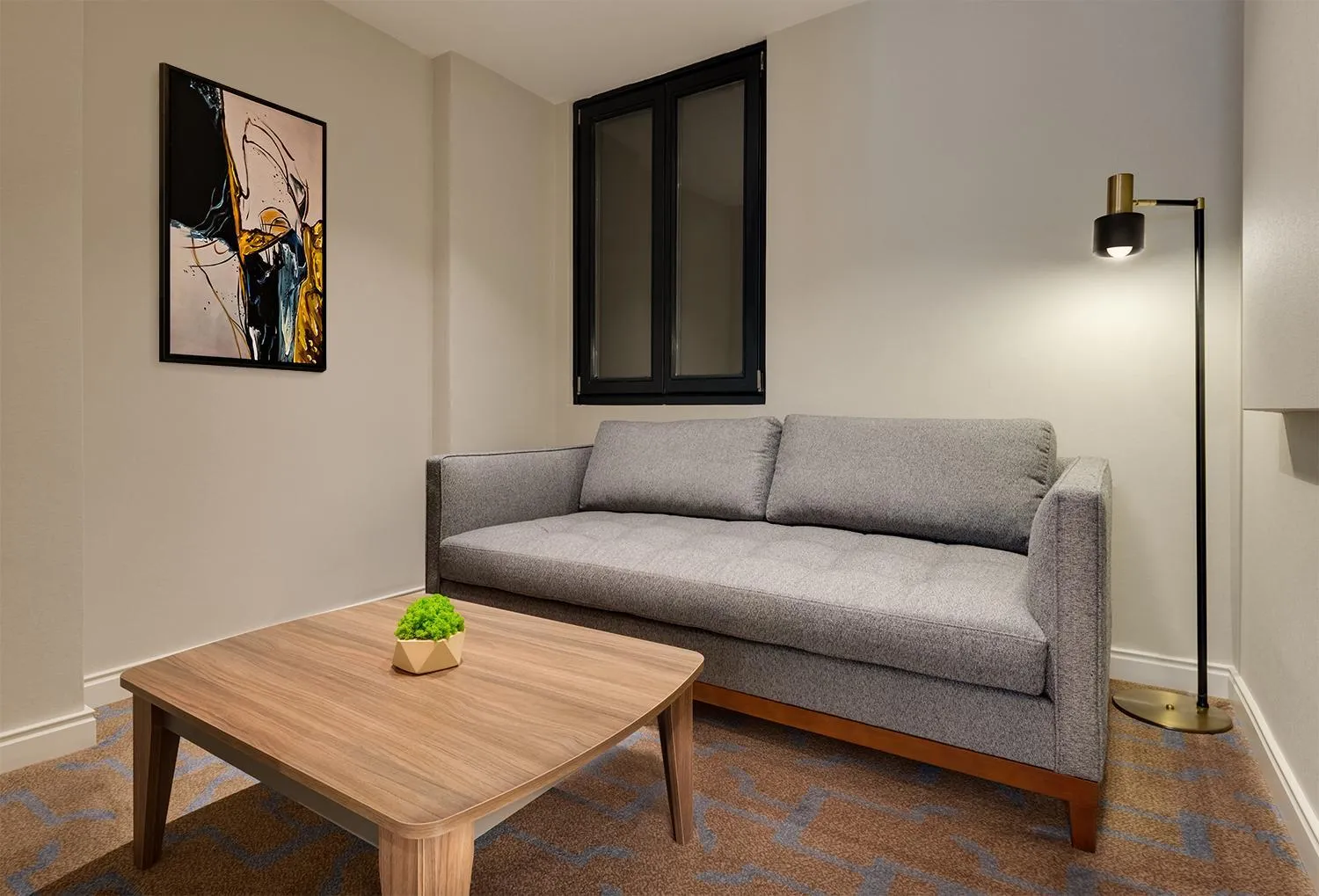 Living room in Gleam Collection Hotel