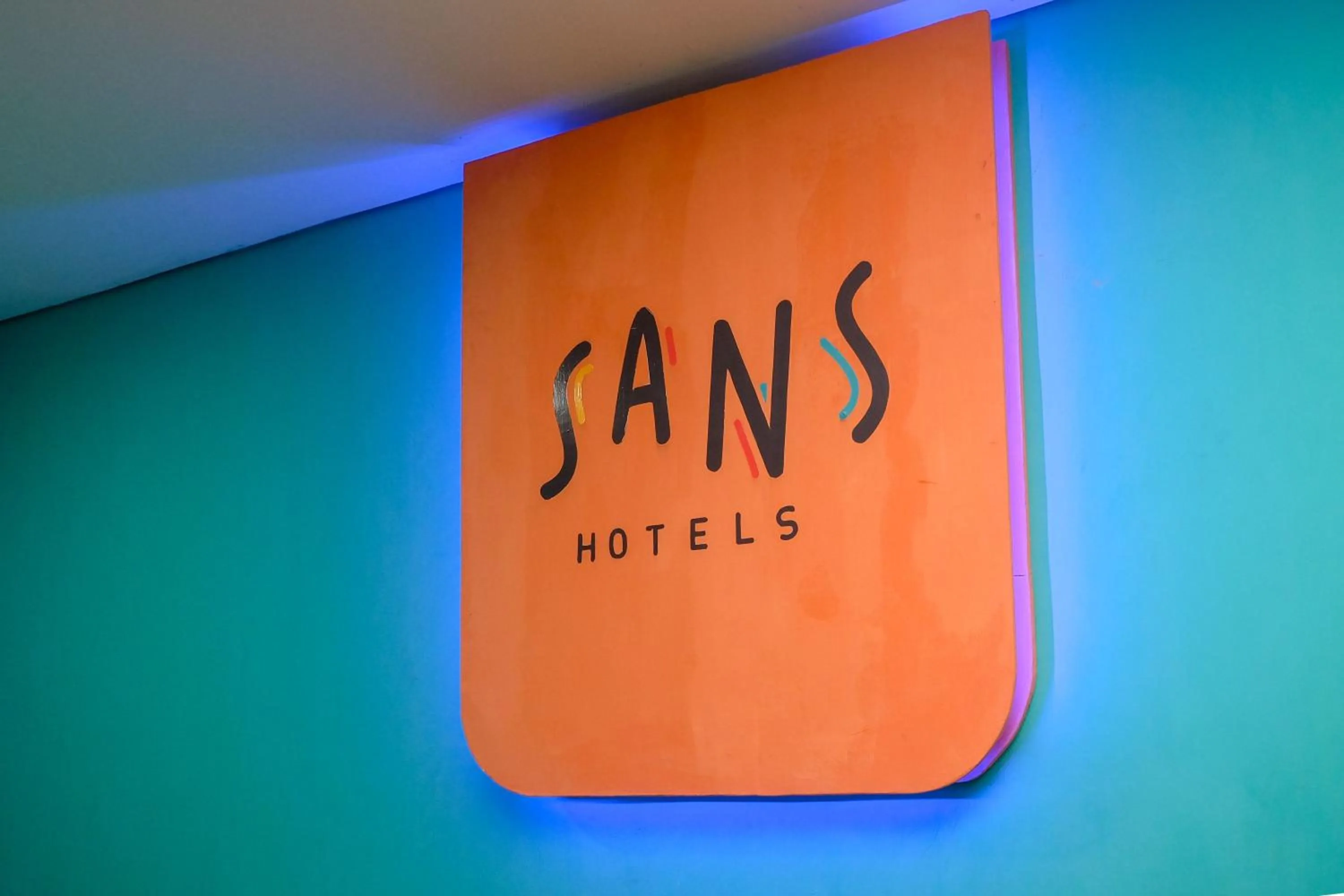 Property logo or sign in Sans Hotel Lynt Makassar