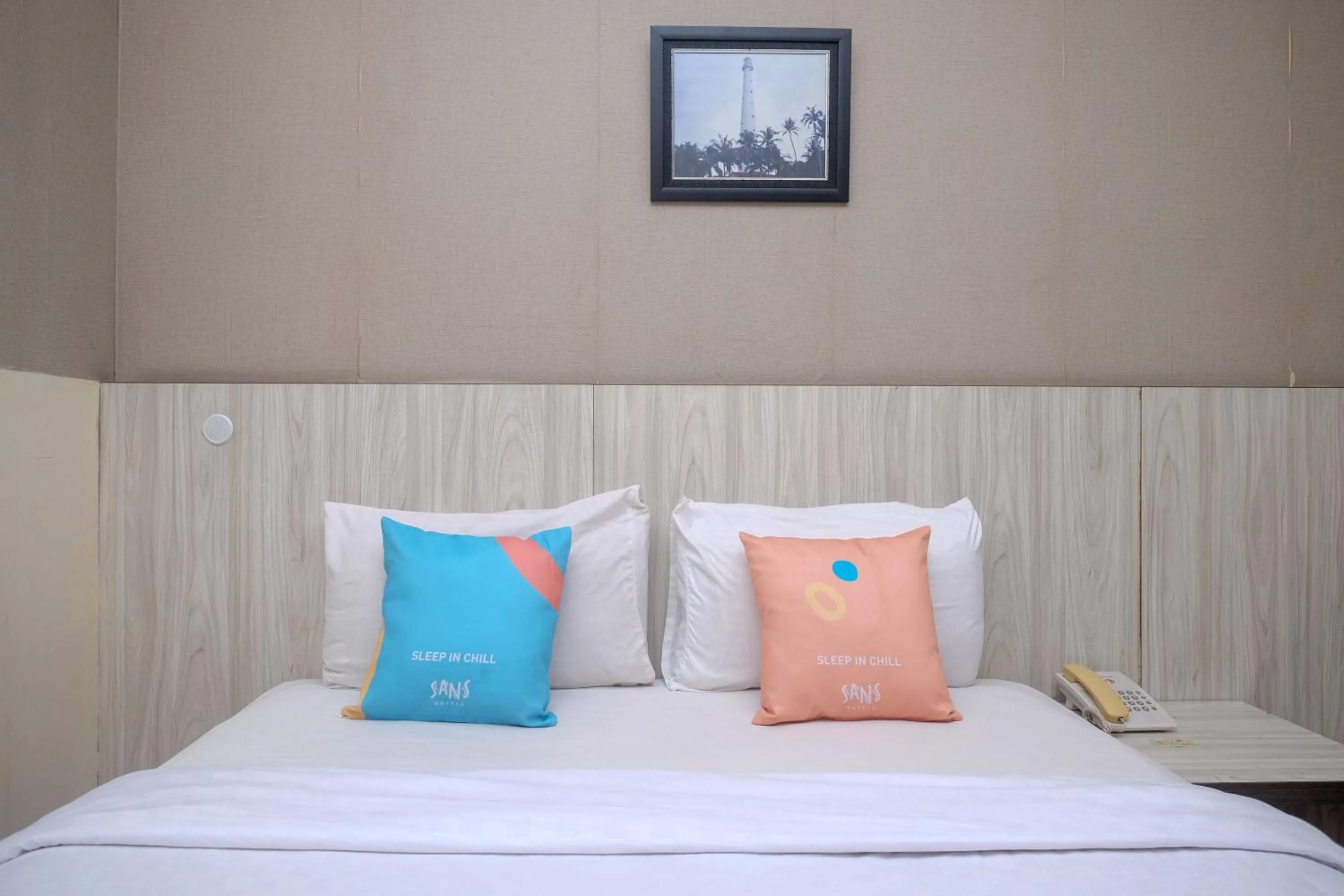 Bedroom in Sans Hotel Lynt Makassar