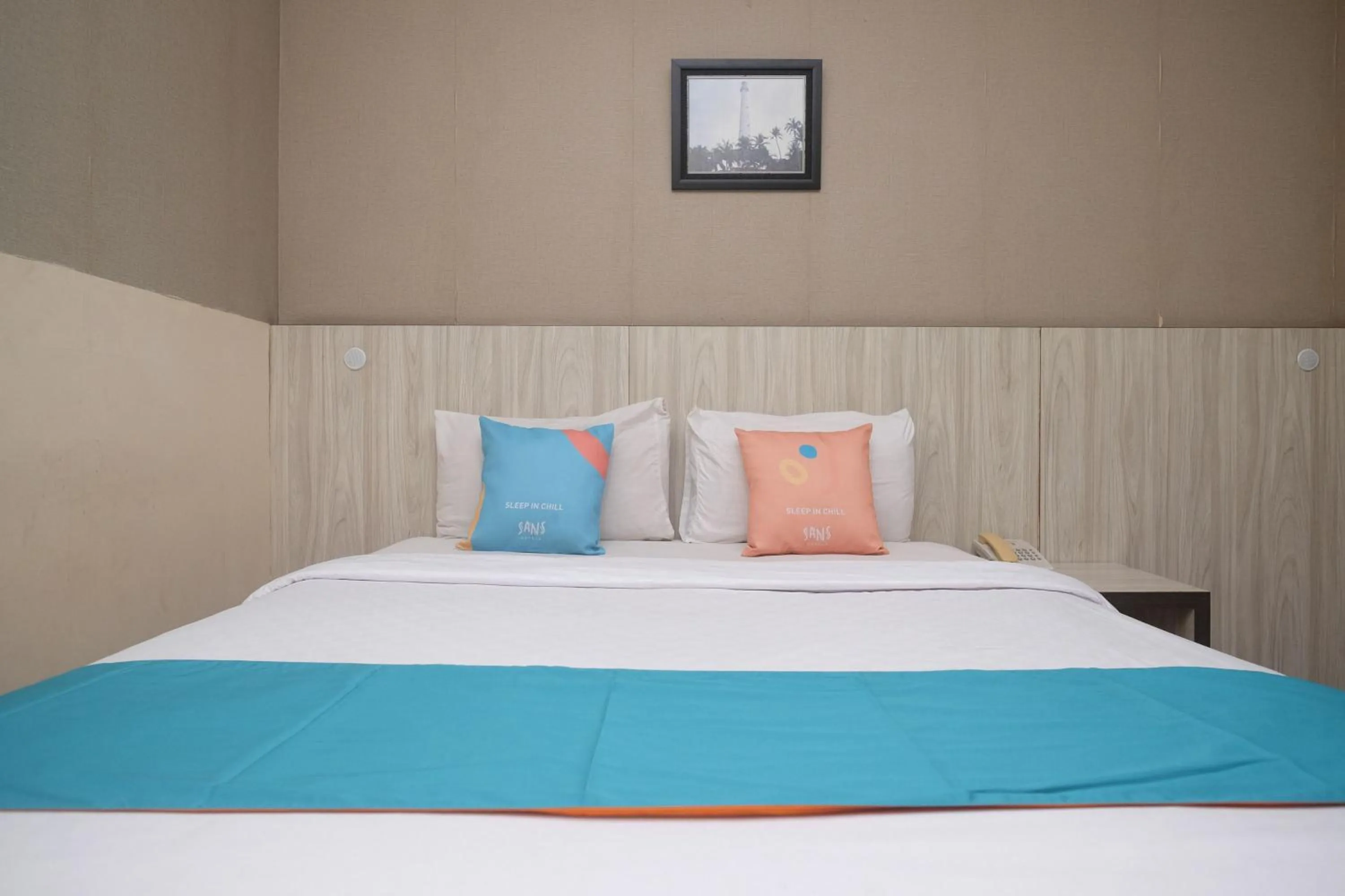 Bedroom in Sans Hotel Lynt Makassar