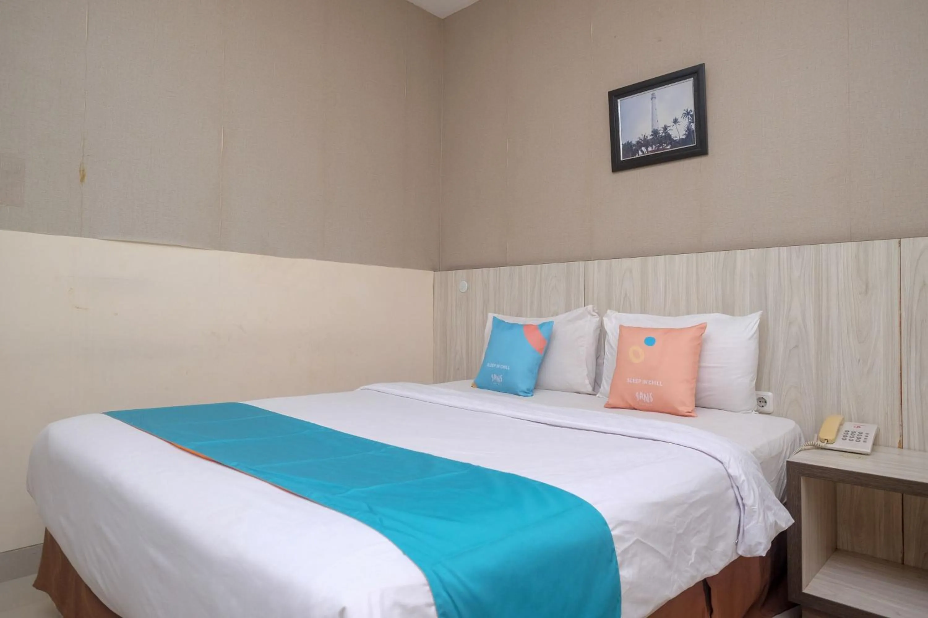 Bedroom in Sans Hotel Lynt Makassar