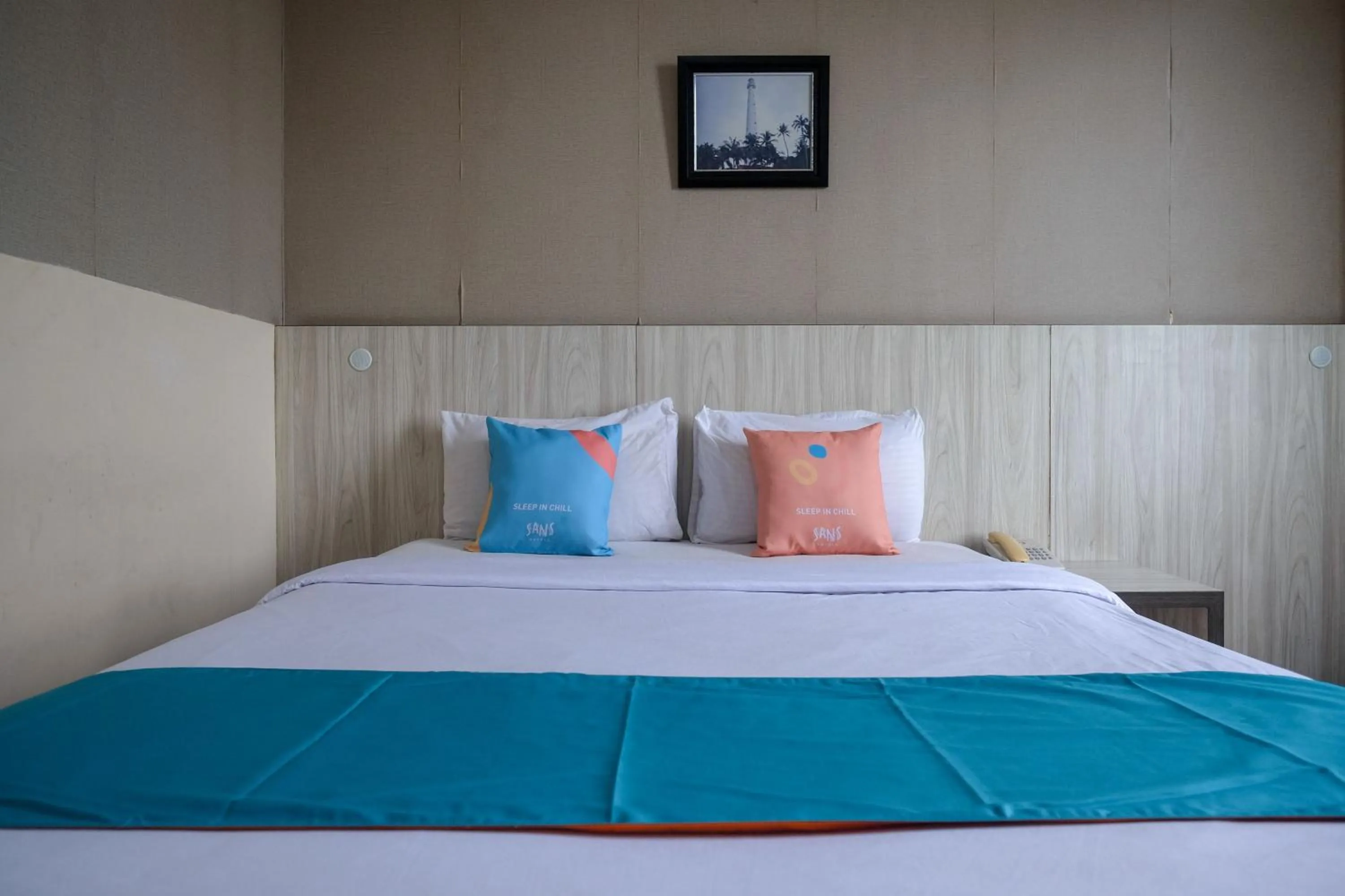 Bedroom in Sans Hotel Lynt Makassar
