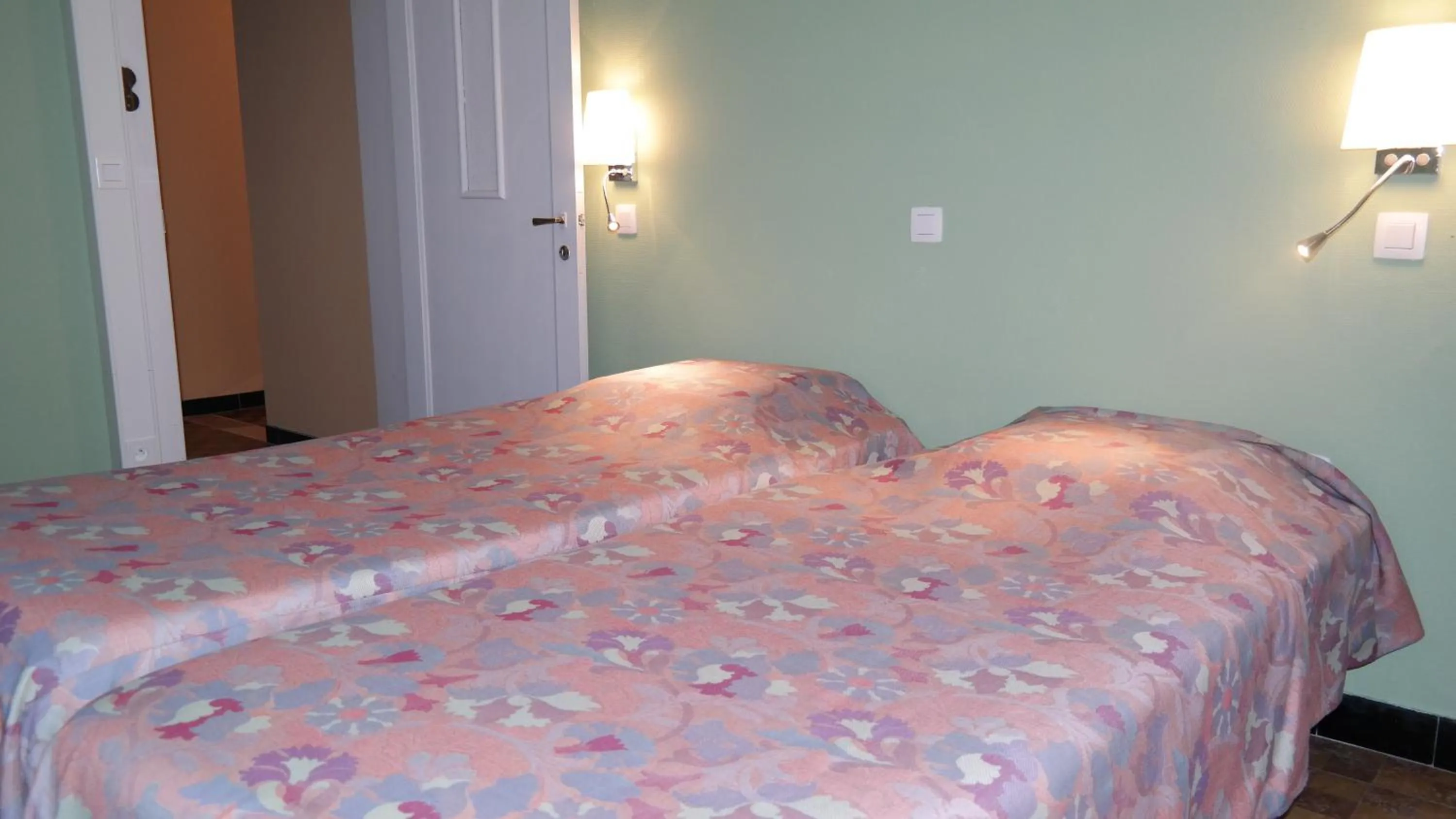 Bed in De Bonte Os Hotel & Tower