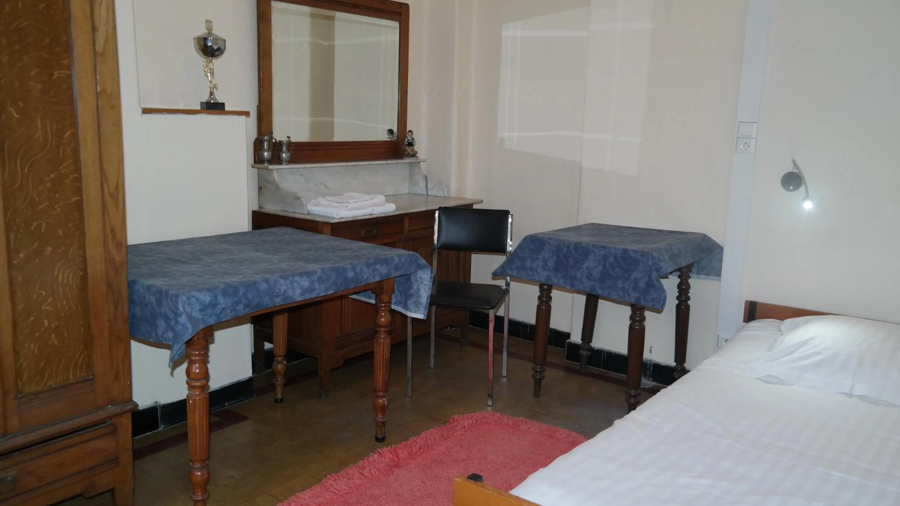 Bed in De Bonte Os Hotel & Tower