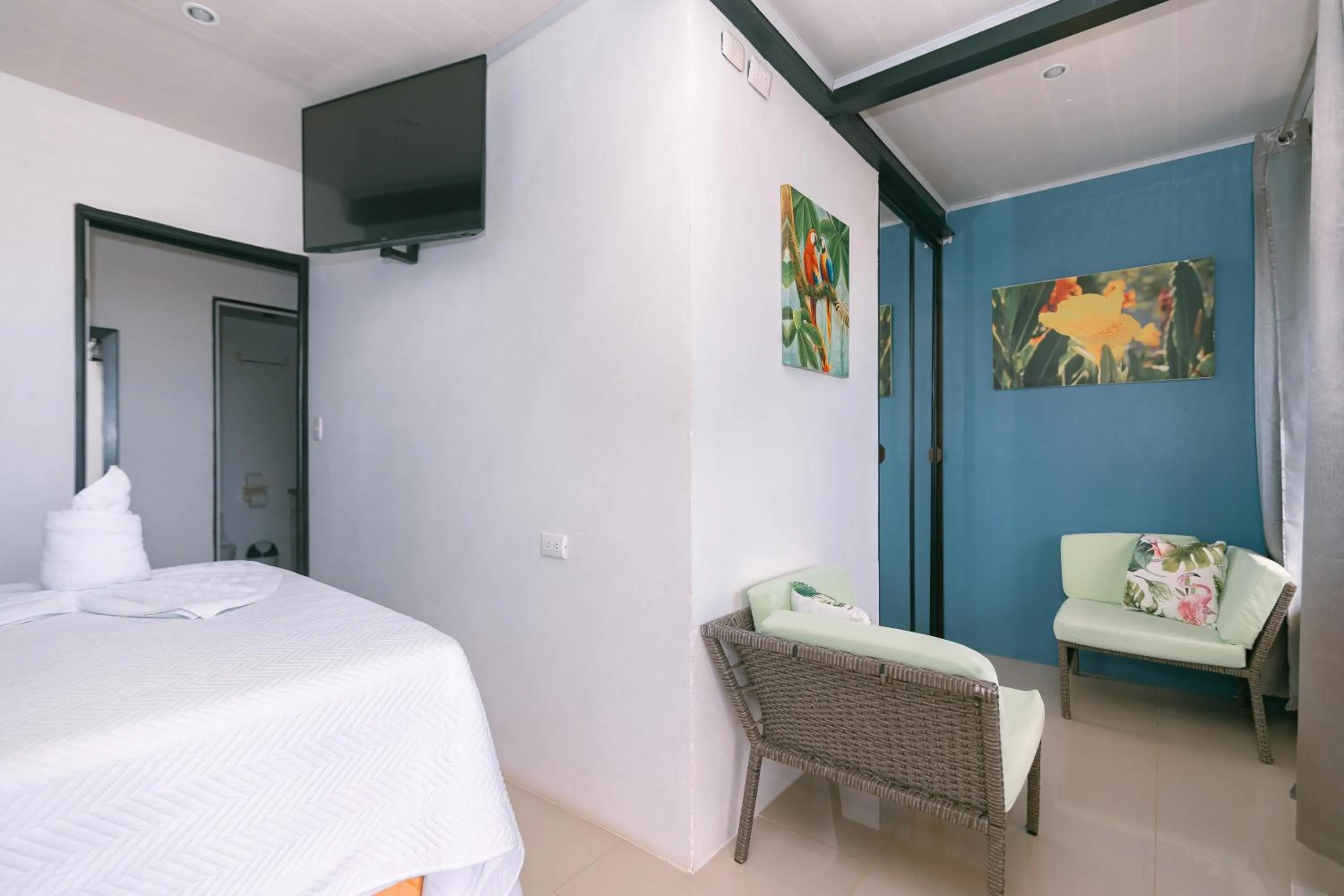 Living room, Bed in Vista del Pacifico Boutique Hotel