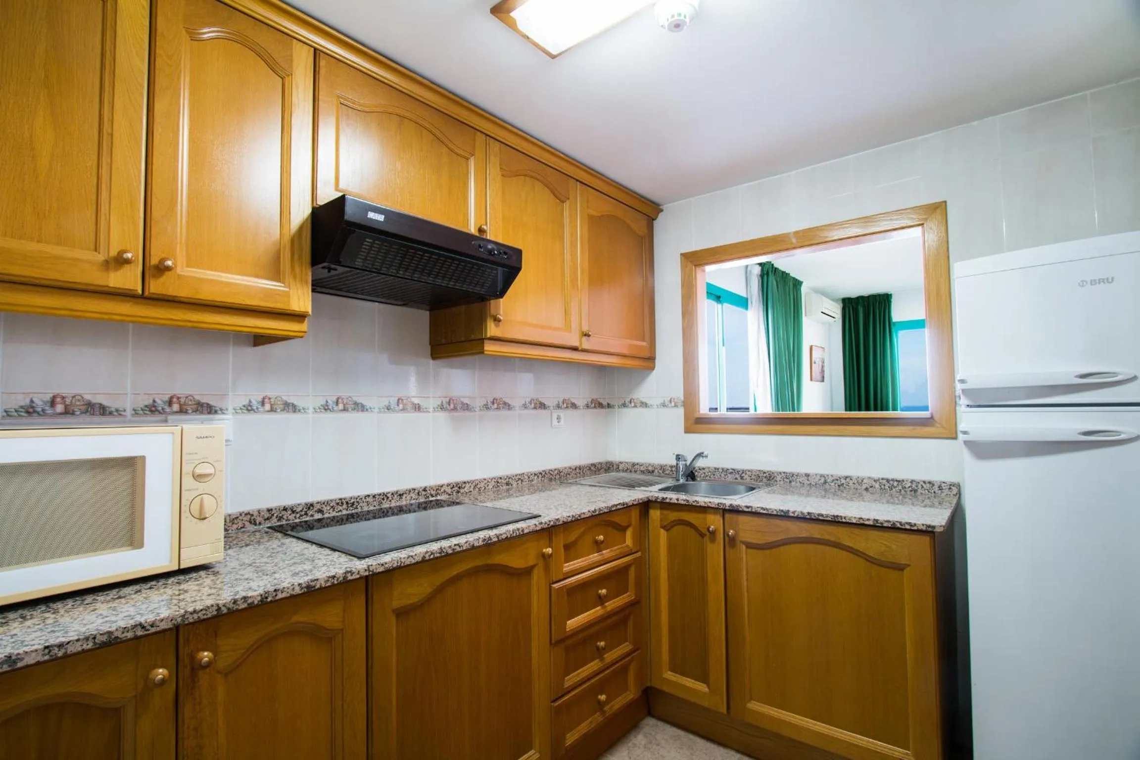 Kitchen or kitchenette in Magic Atrium Beach