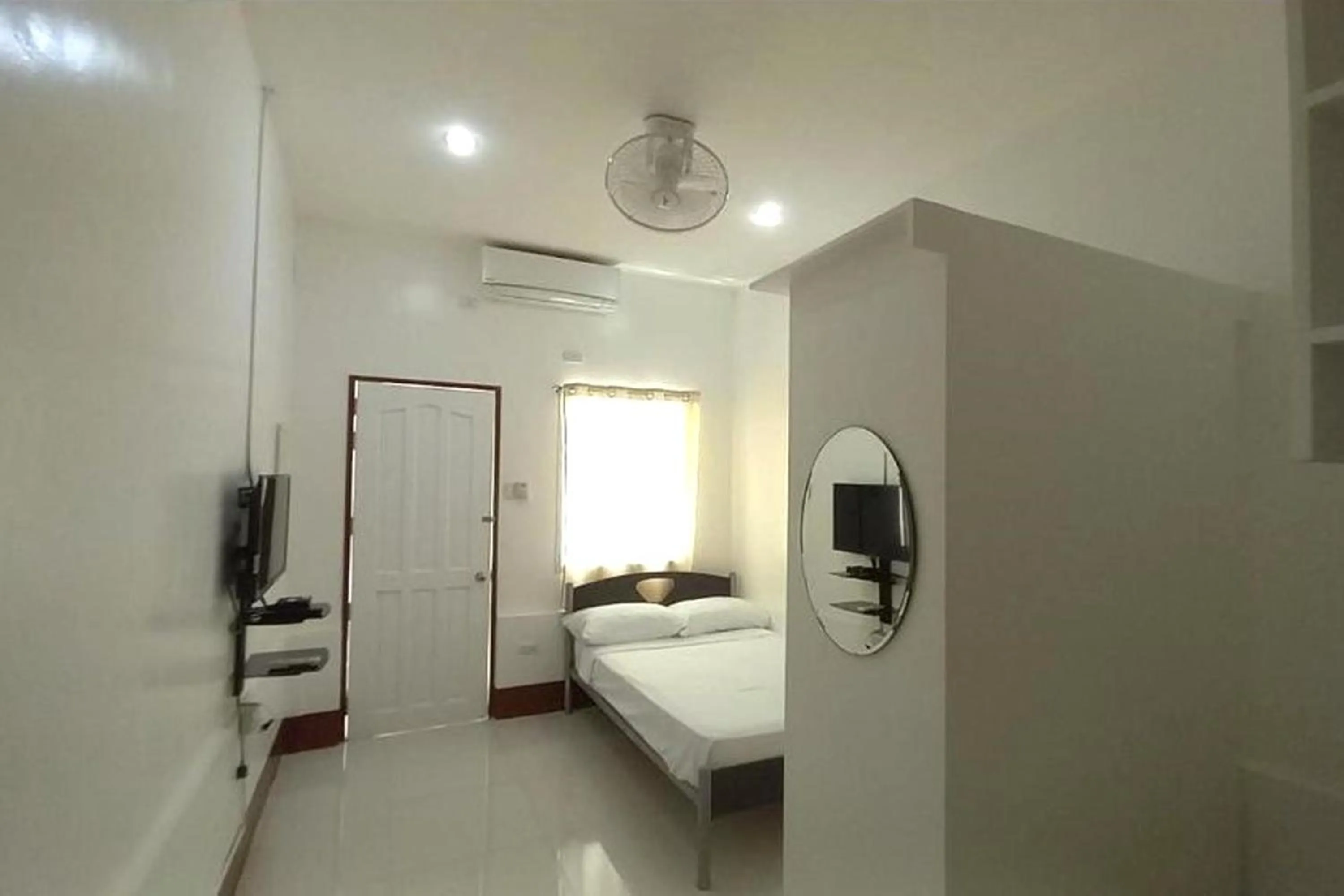 Bed in Palajuanders Inn Palawan