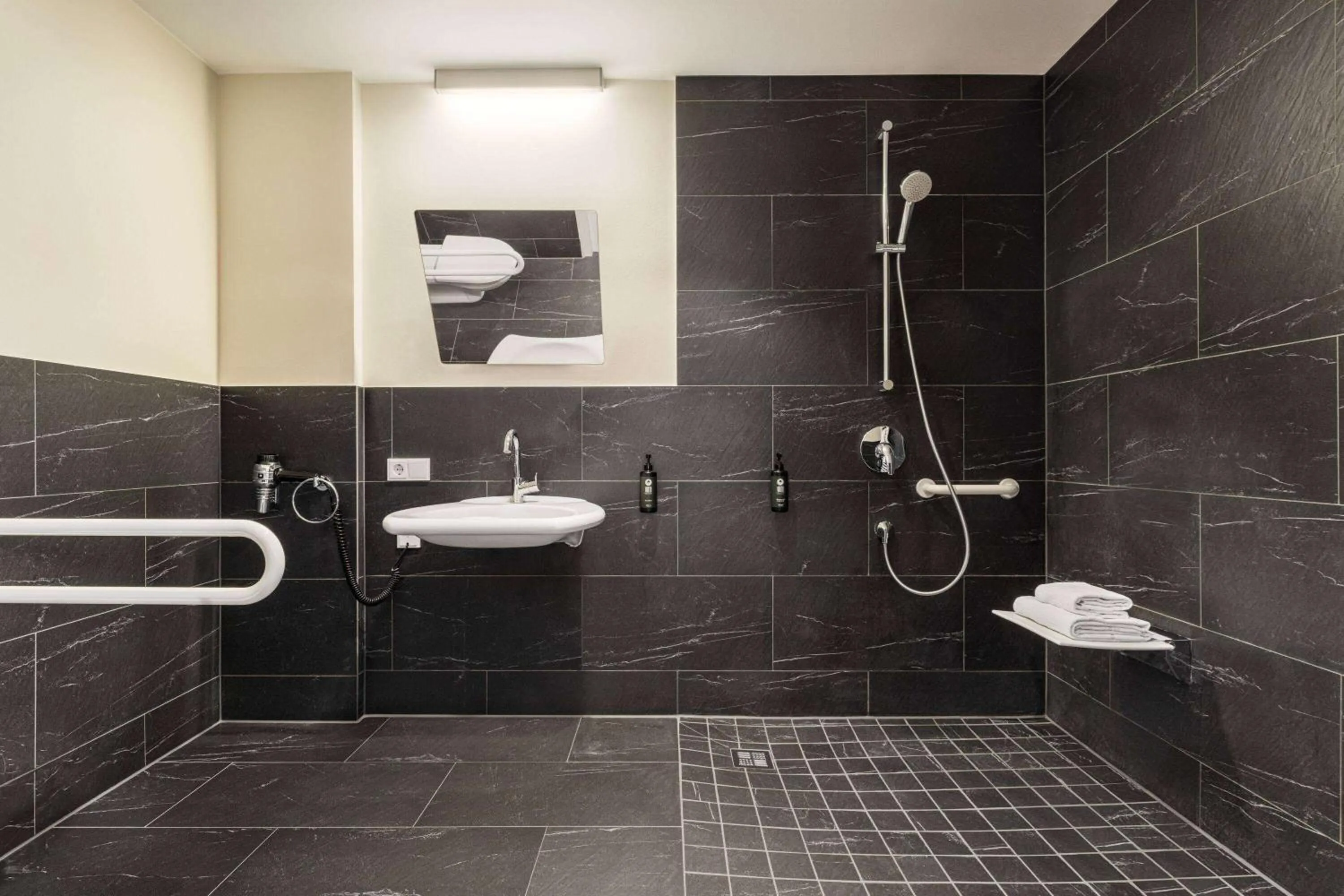 Shower in Vienna House Easy by Wyndham München