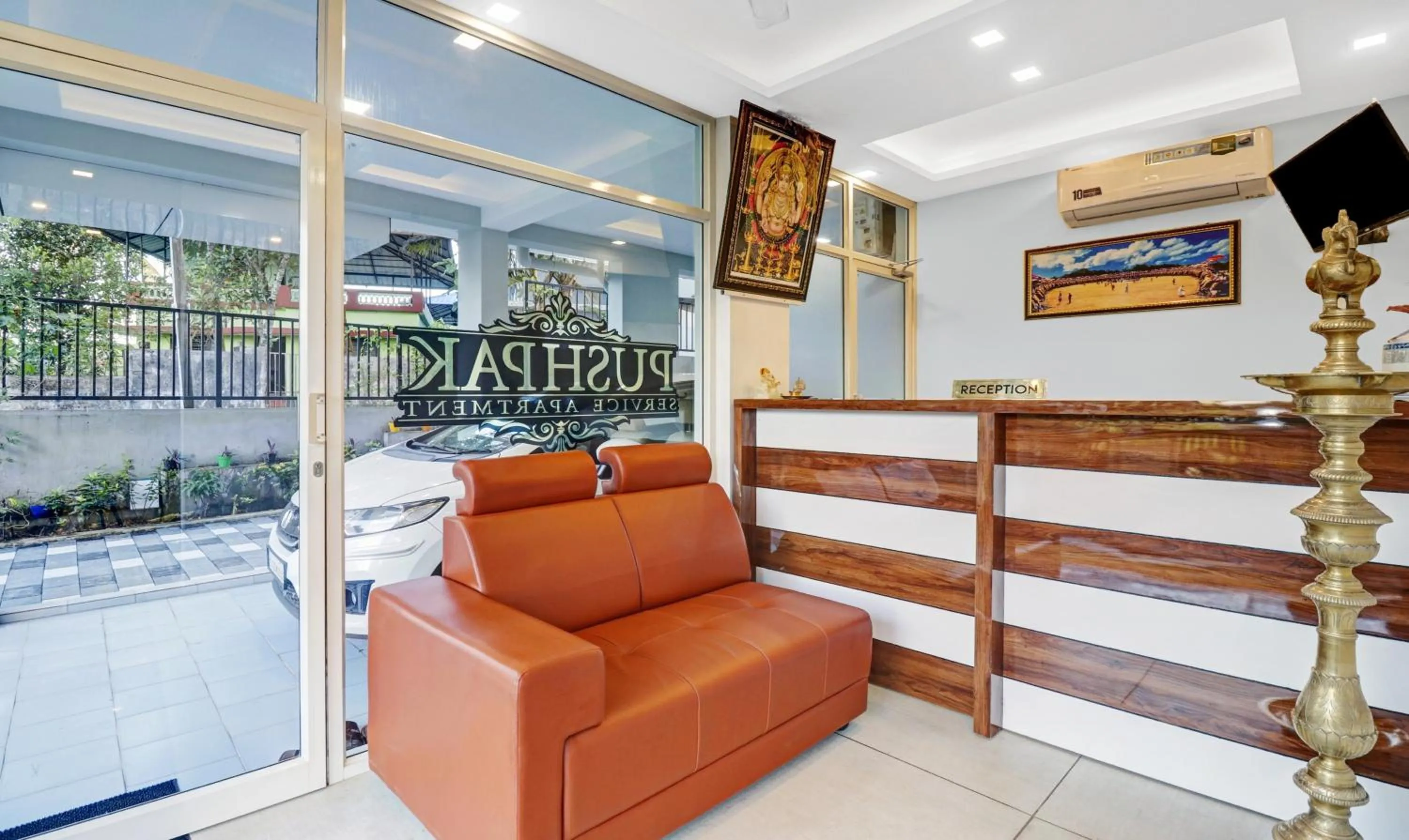 Seating area in Treebo Pushpak 100 Mtrs From Chottanikkara Temple