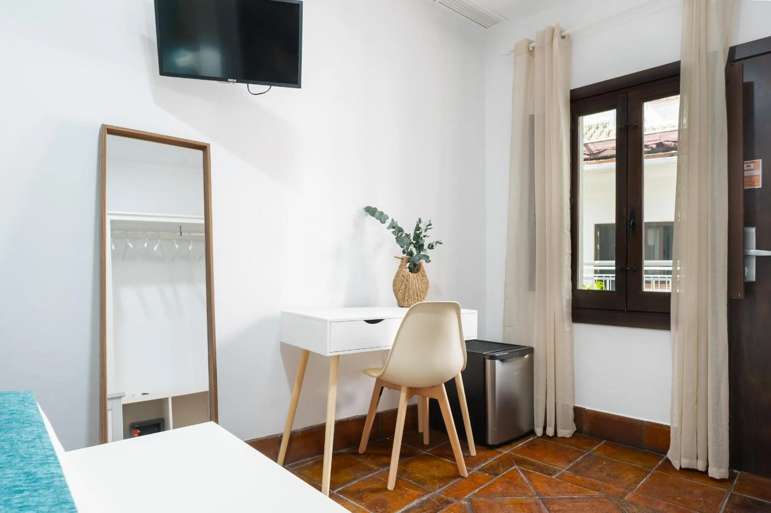 TV and multimedia in Hotel Boutique Puerta del Rincón