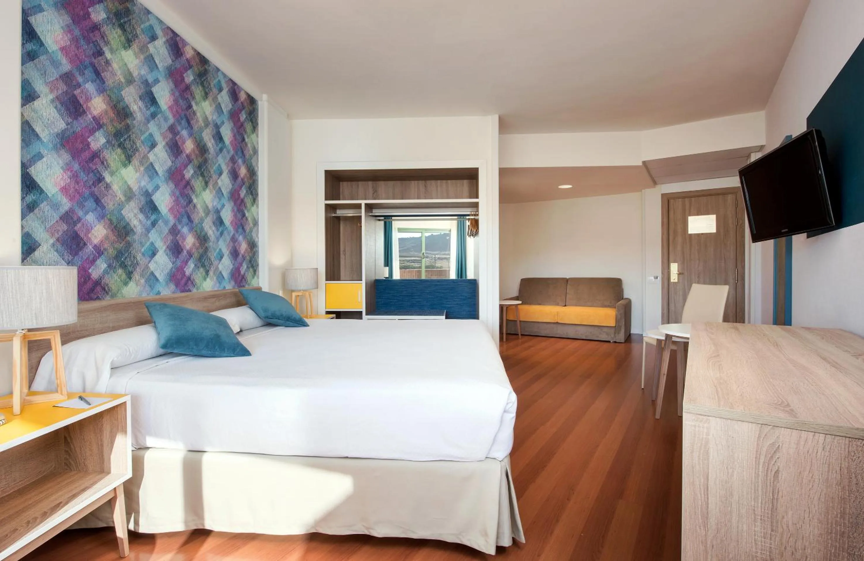 Photo of the whole room, Bed in Hotel Guadalajara & Conference Center Affiliated by Meliá