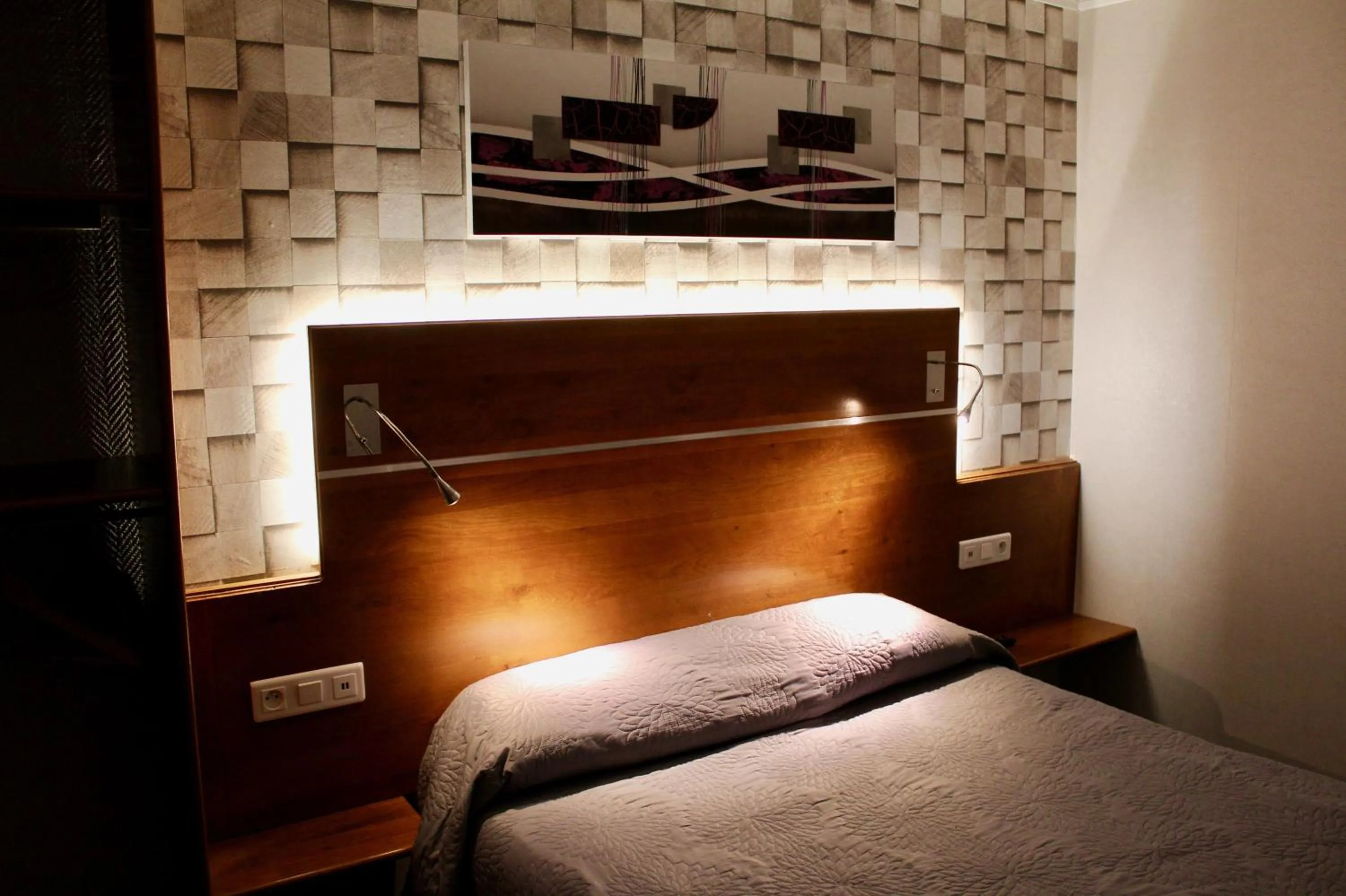 Bed in Hotel des Pyrénées