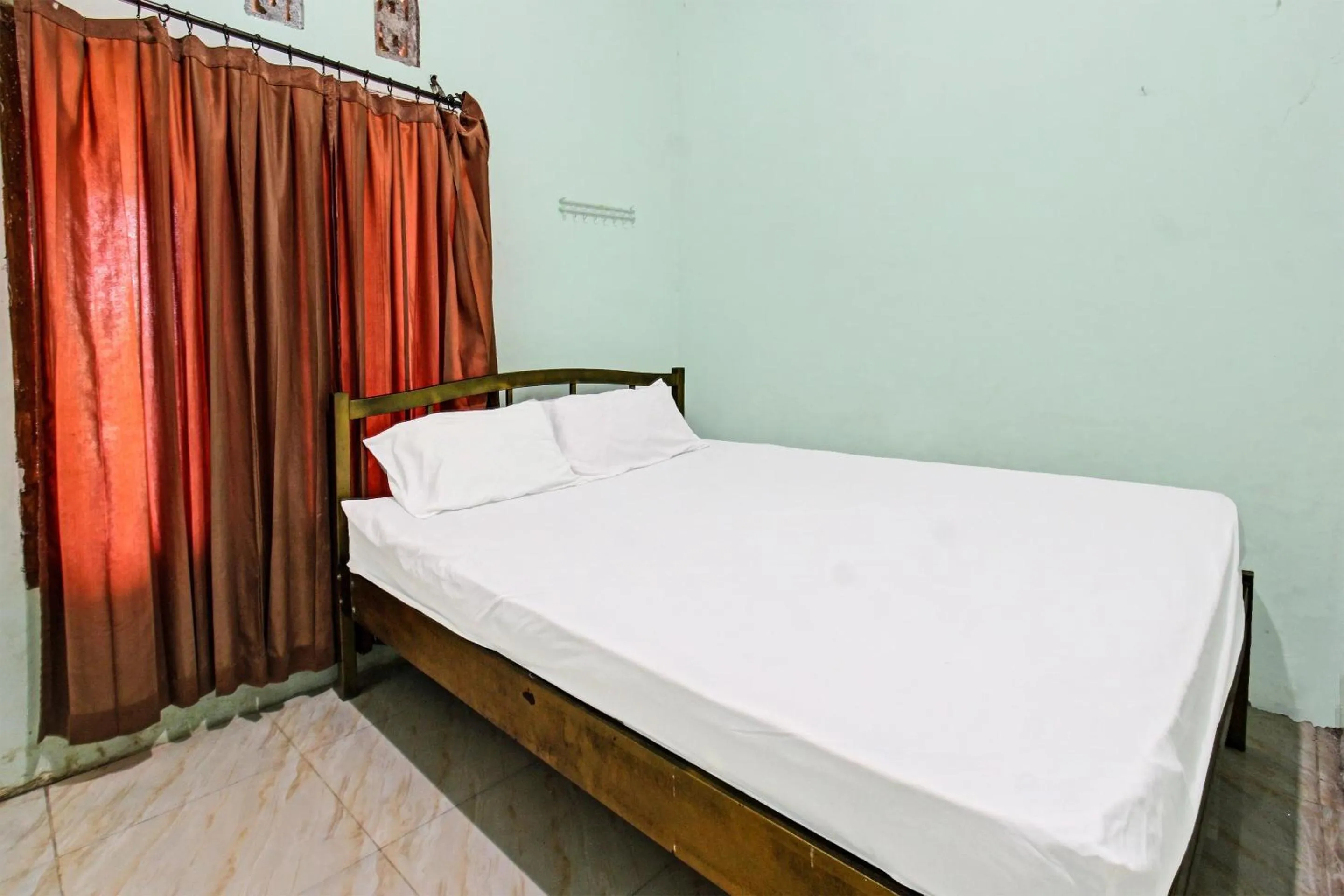 Bedroom, Bed in Hotel O Homestay Bang HajiNearLapangan Penujak ( Inen Gonggang)