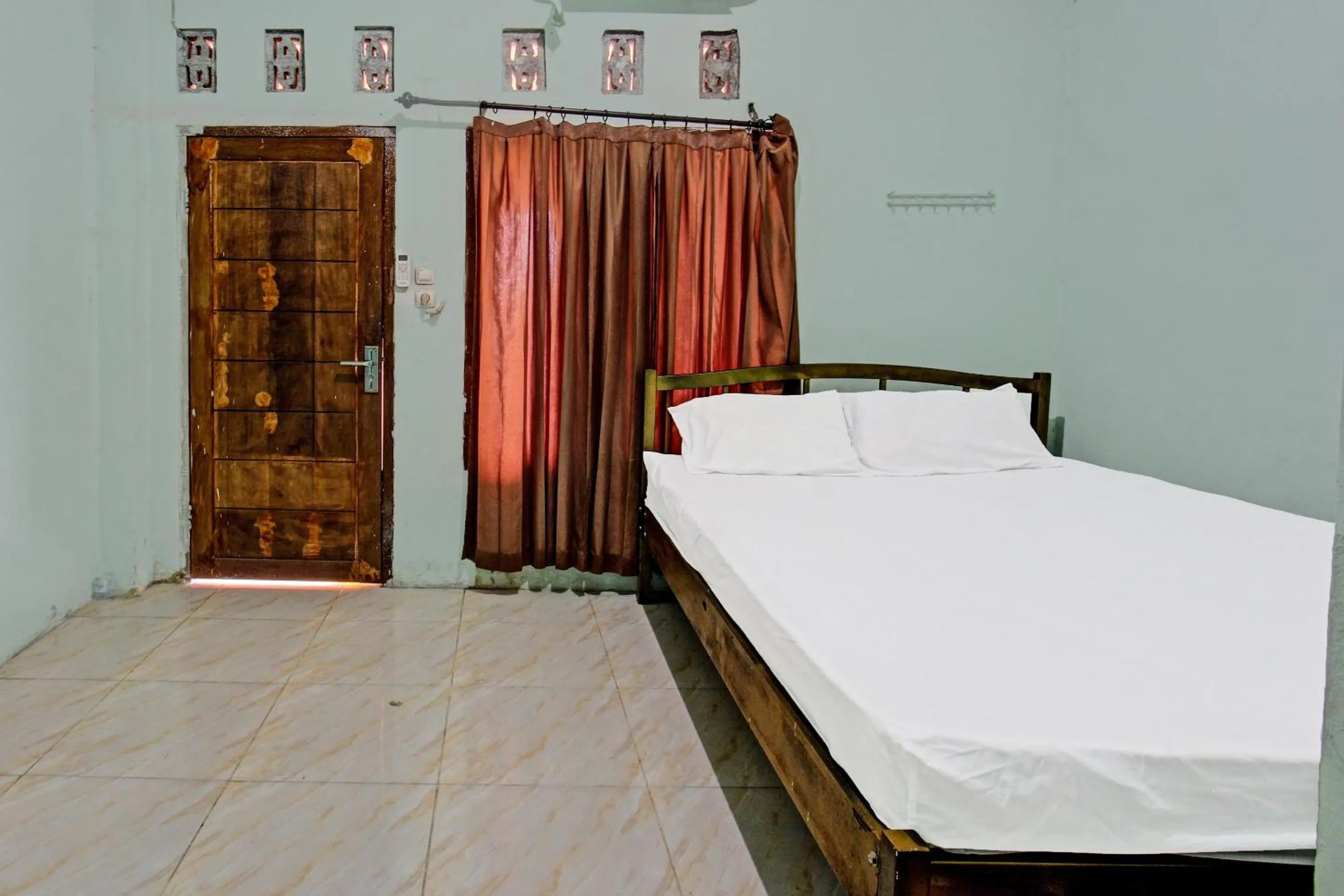 Bedroom, Bed in Hotel O Homestay Bang HajiNearLapangan Penujak ( Inen Gonggang)