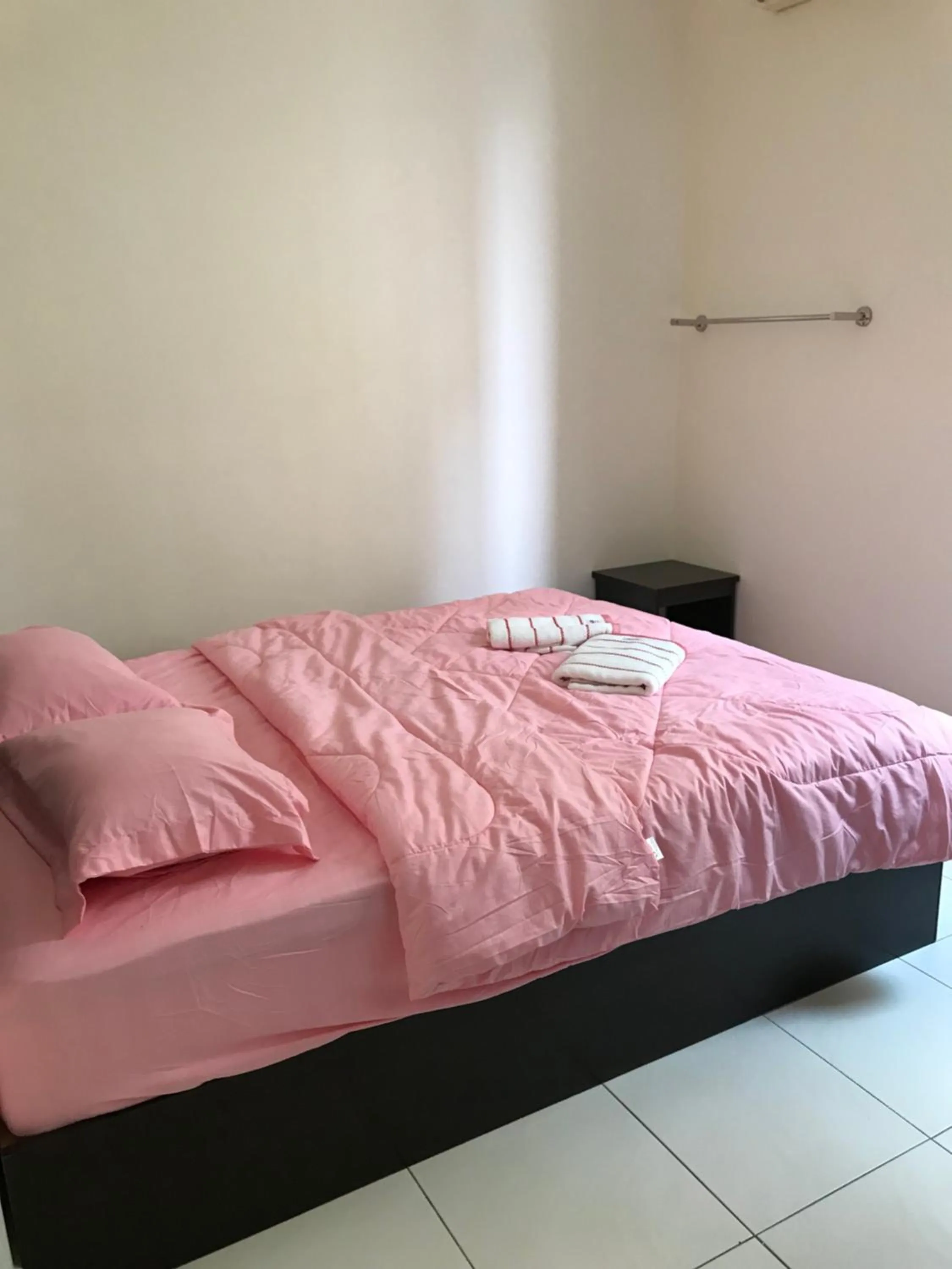 Bed in Intanova Hotel