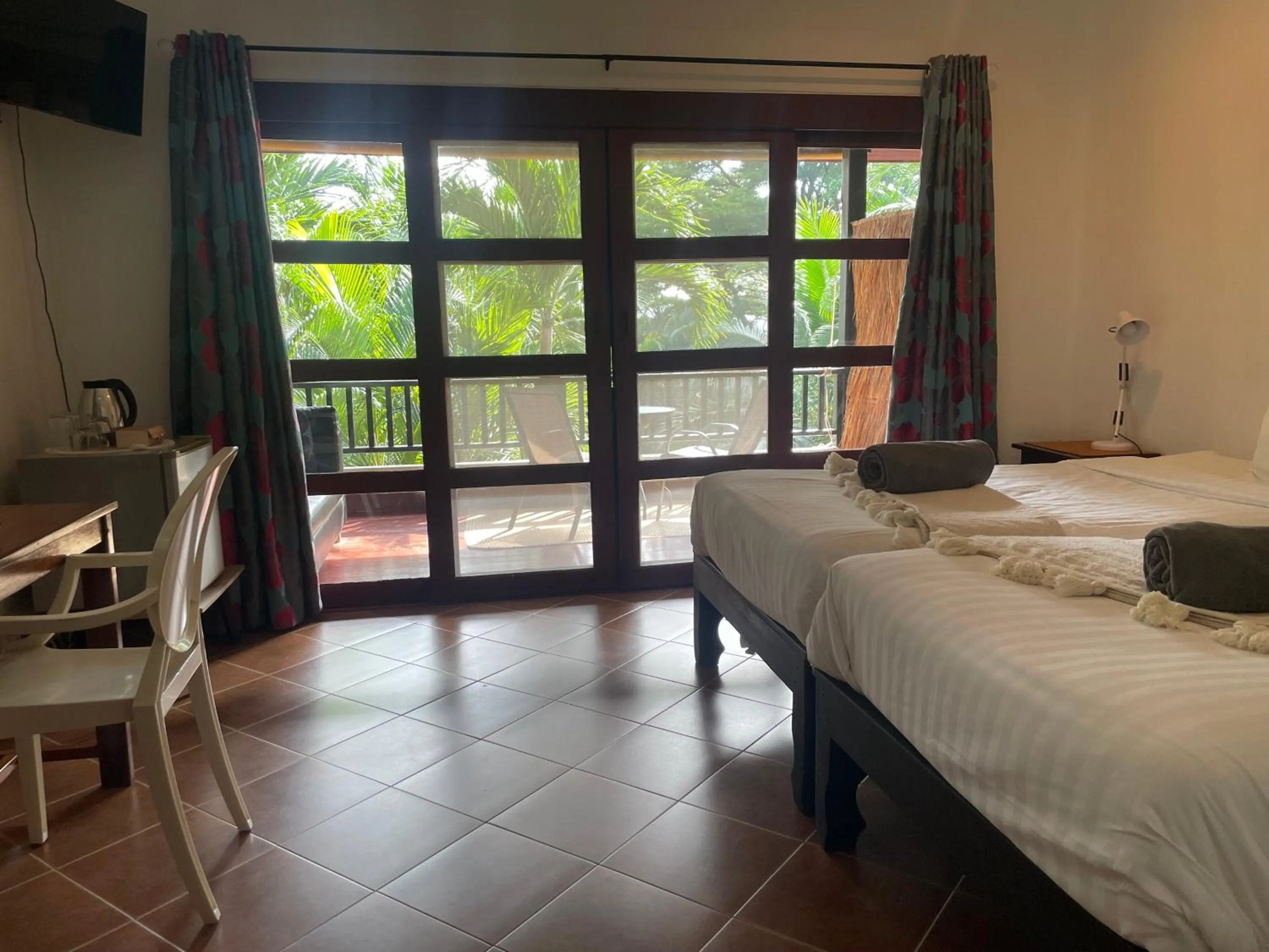 Photo of the whole room, Bed in Jade cottages