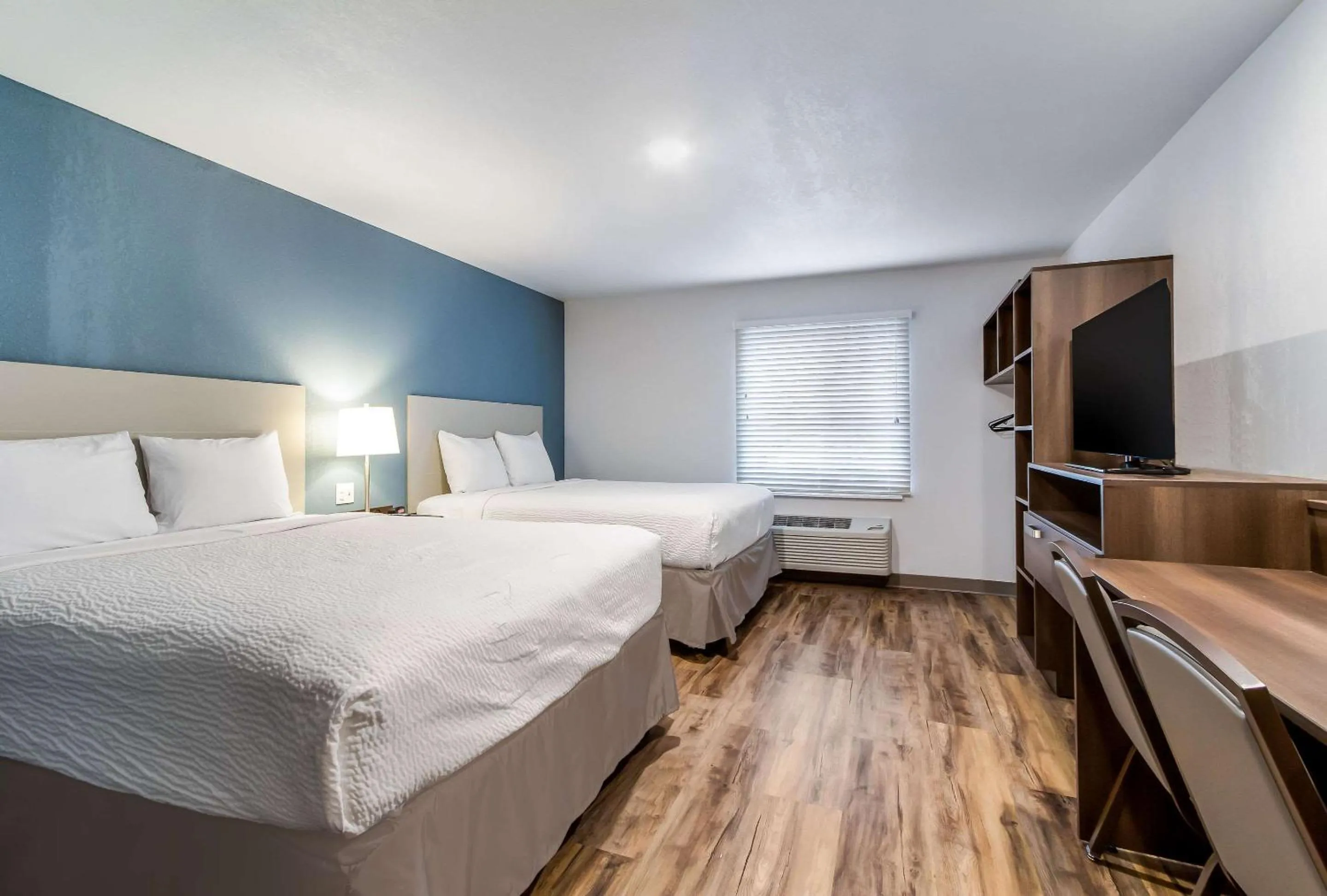 Bedroom, Bed in WoodSpring Suites Harrisburg Linglestown