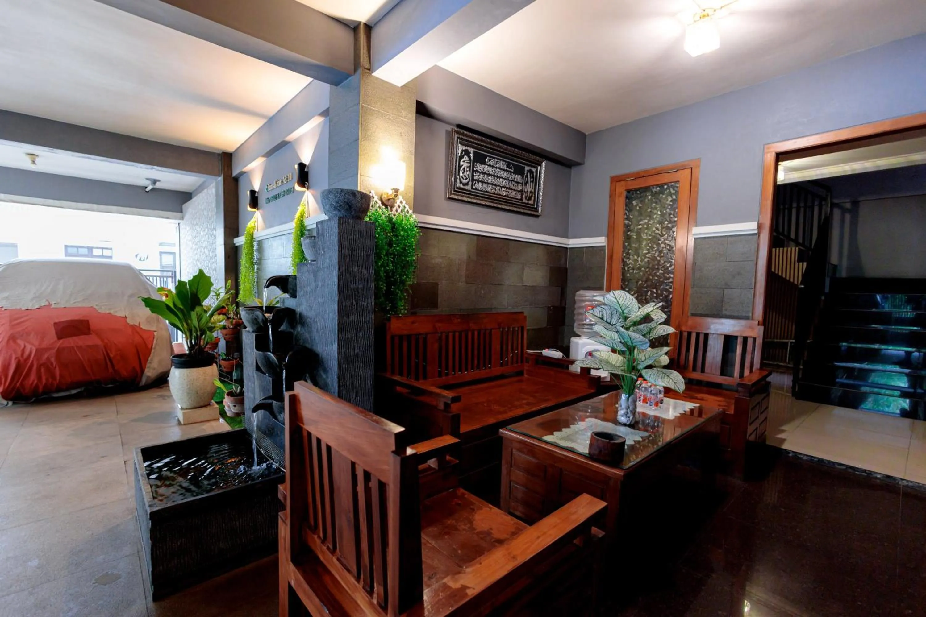 Seating area in SUPER OYO Collection O 91726 Alif Ab11 Syariah