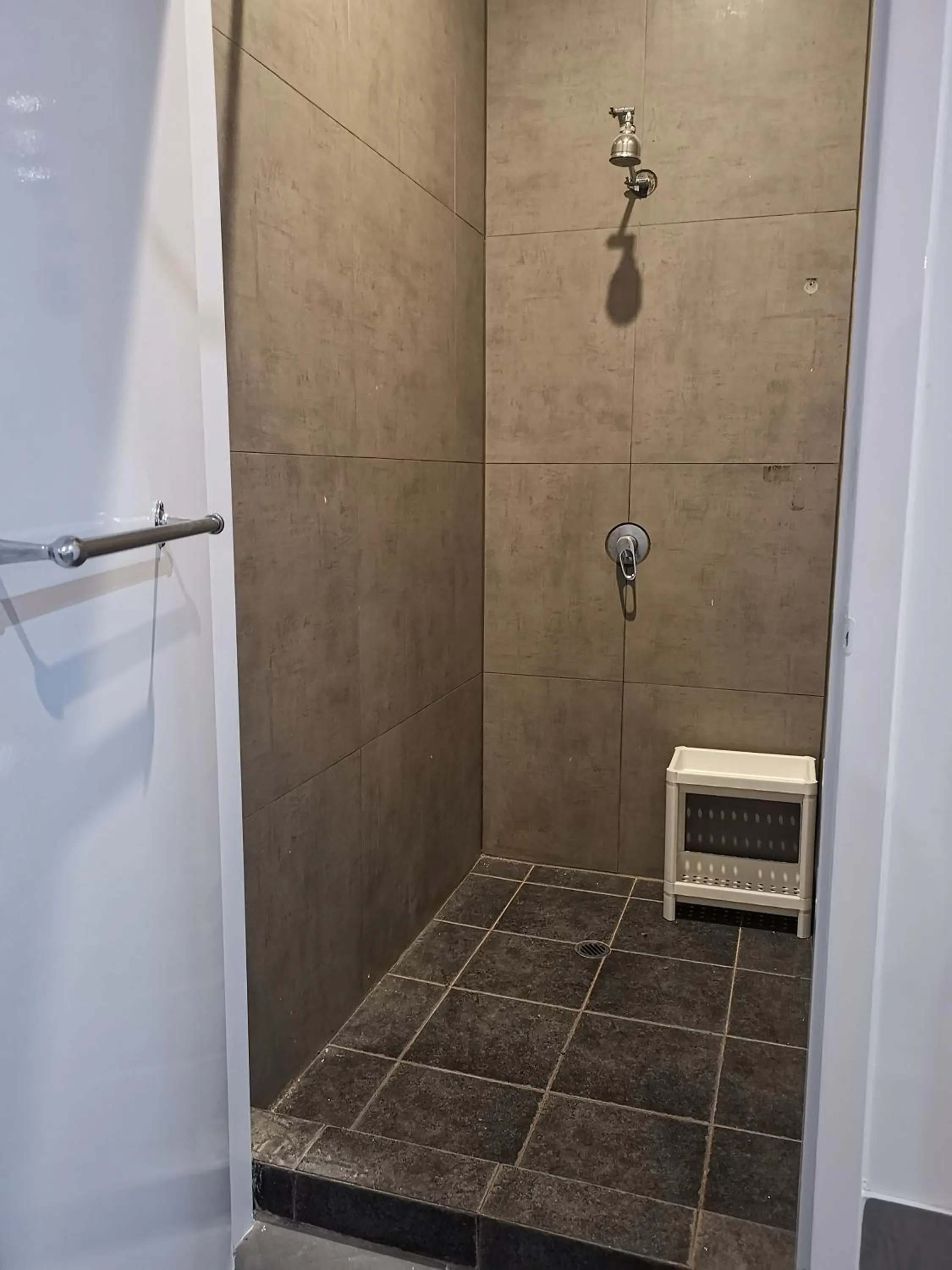 Shower in Quokka Backpackers Hostel Perth - note - Valid passport required to check in