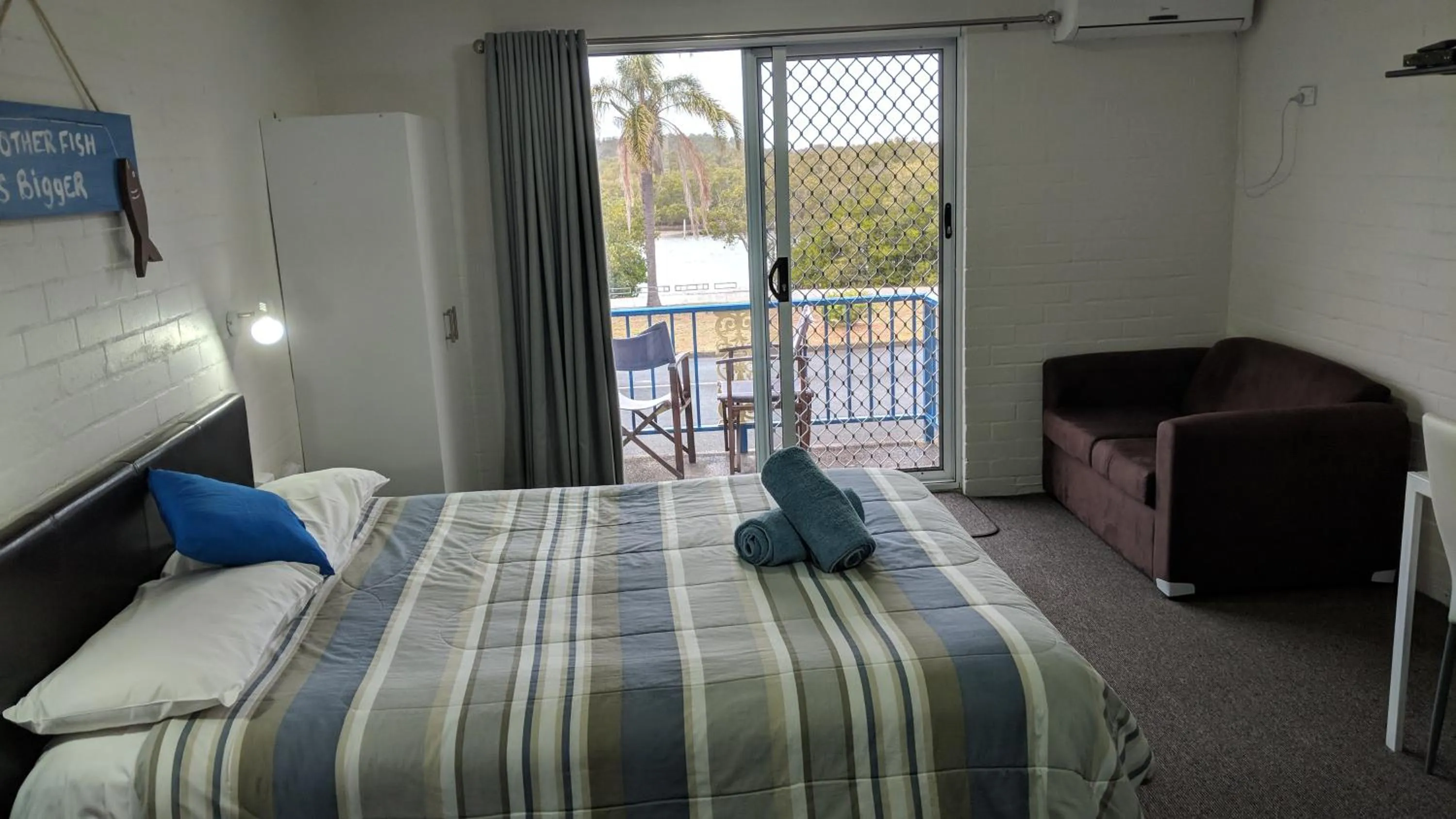 Bed in Harrington Village Motel