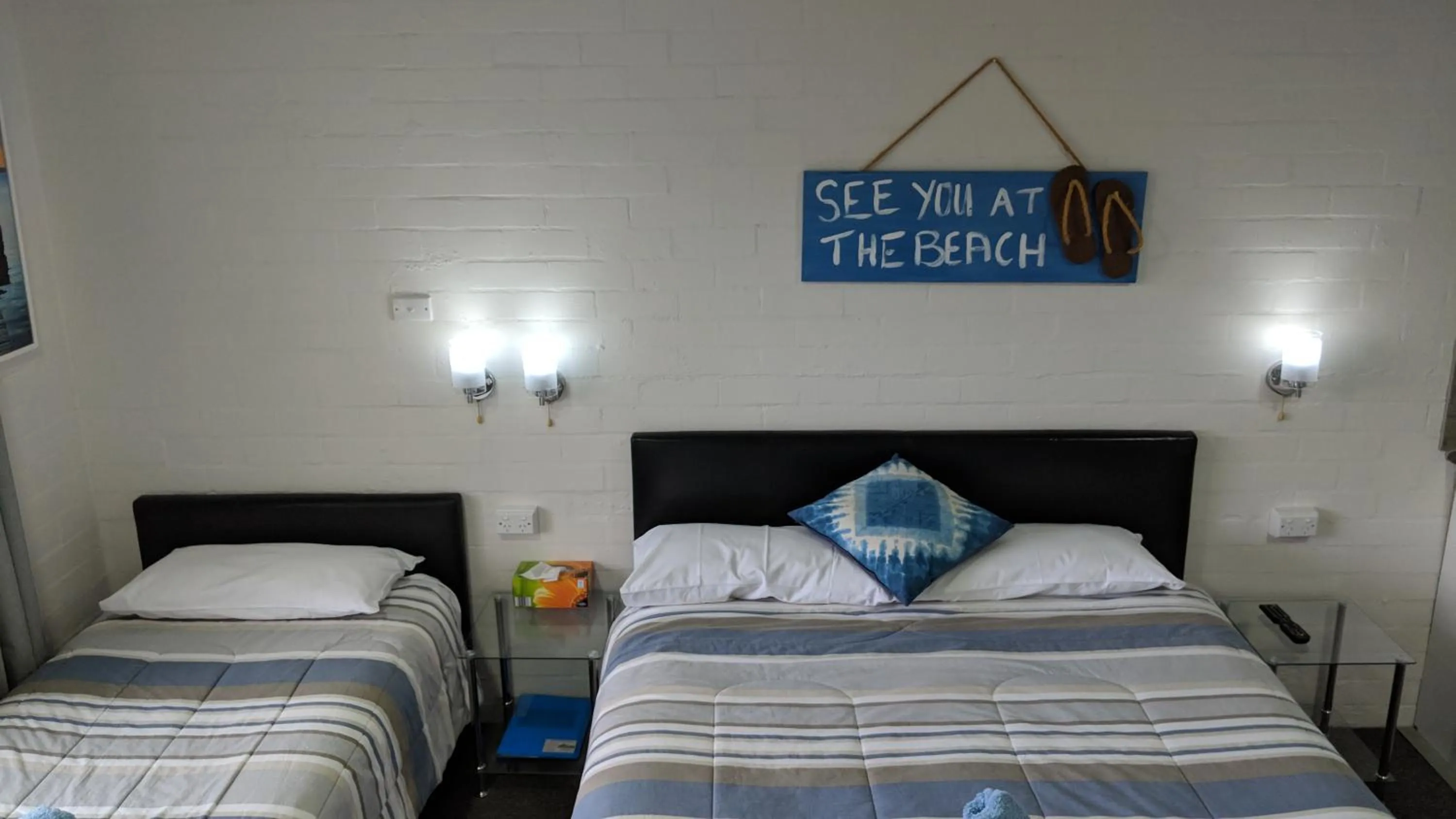 Bed in Harrington Village Motel