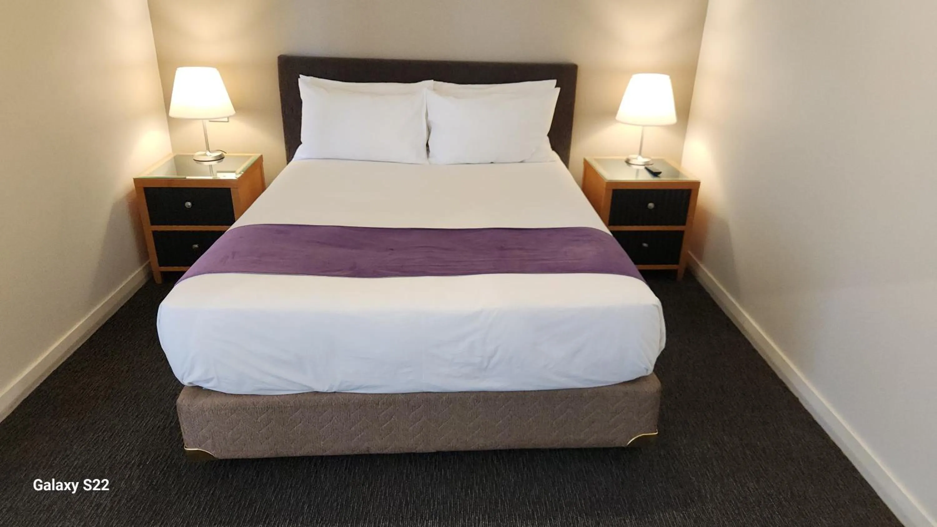 Bed in The Grand Motel