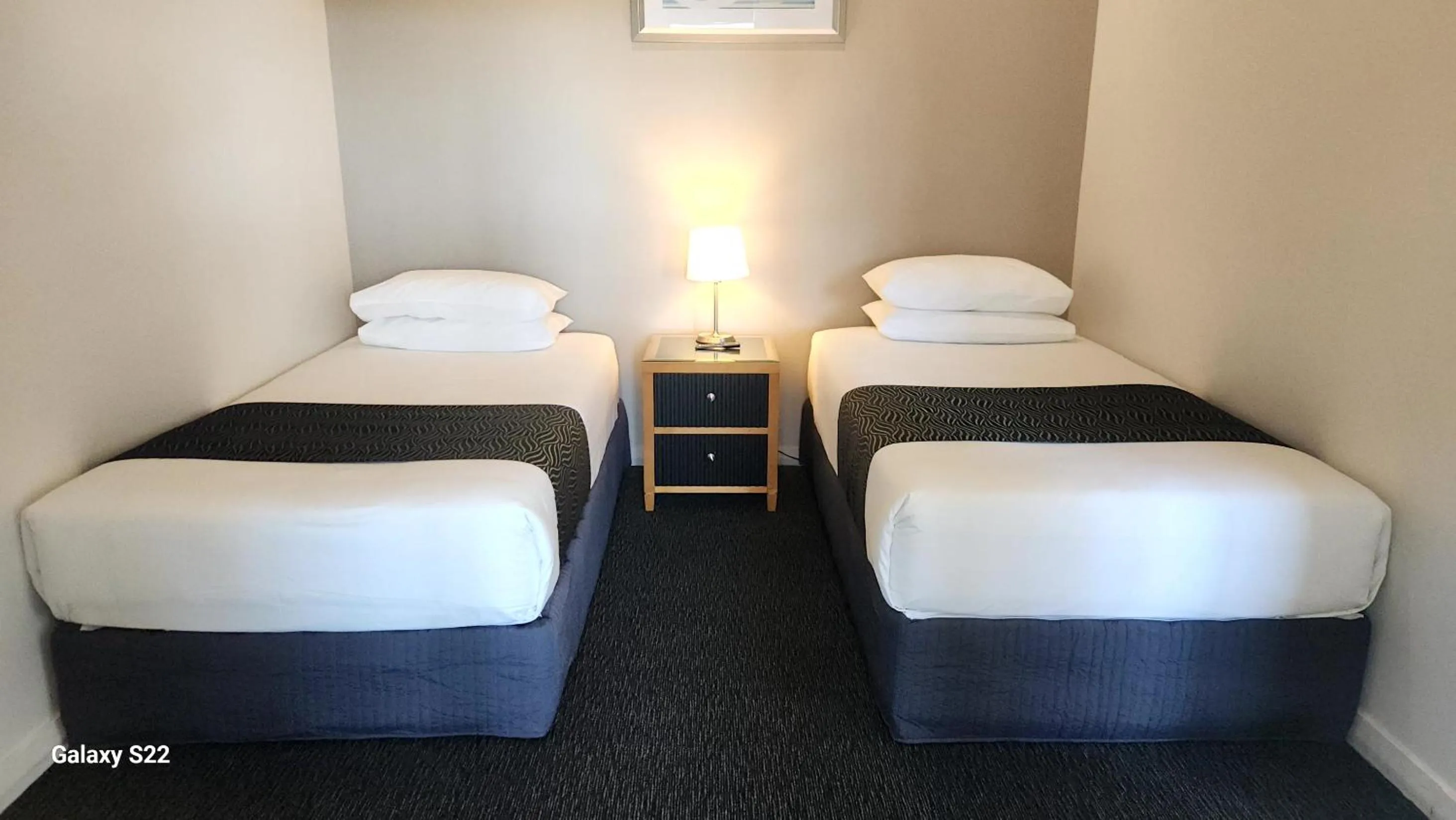 Bed in The Grand Motel