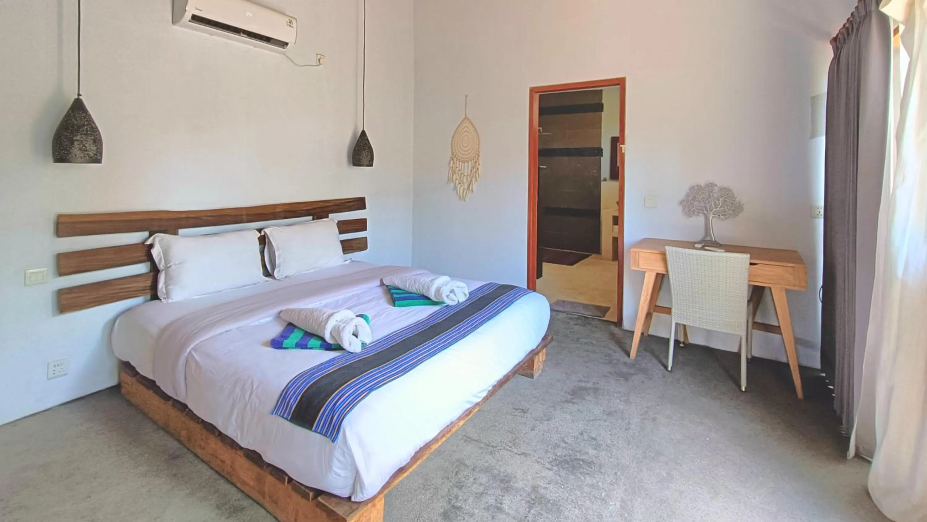 Bed in Kies Villas Lombok