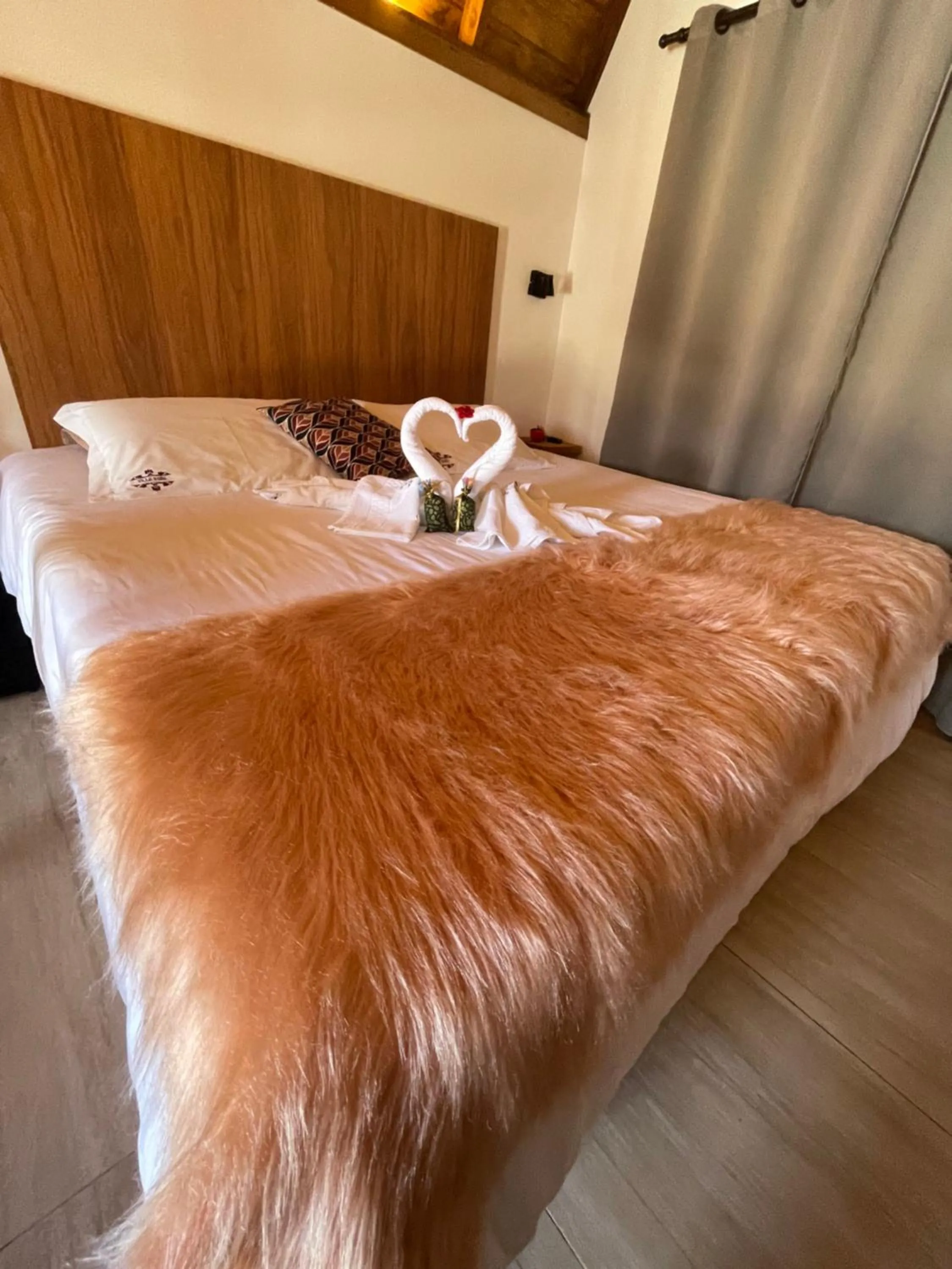 Bed in VILLA ITÁLIA CHALÉ