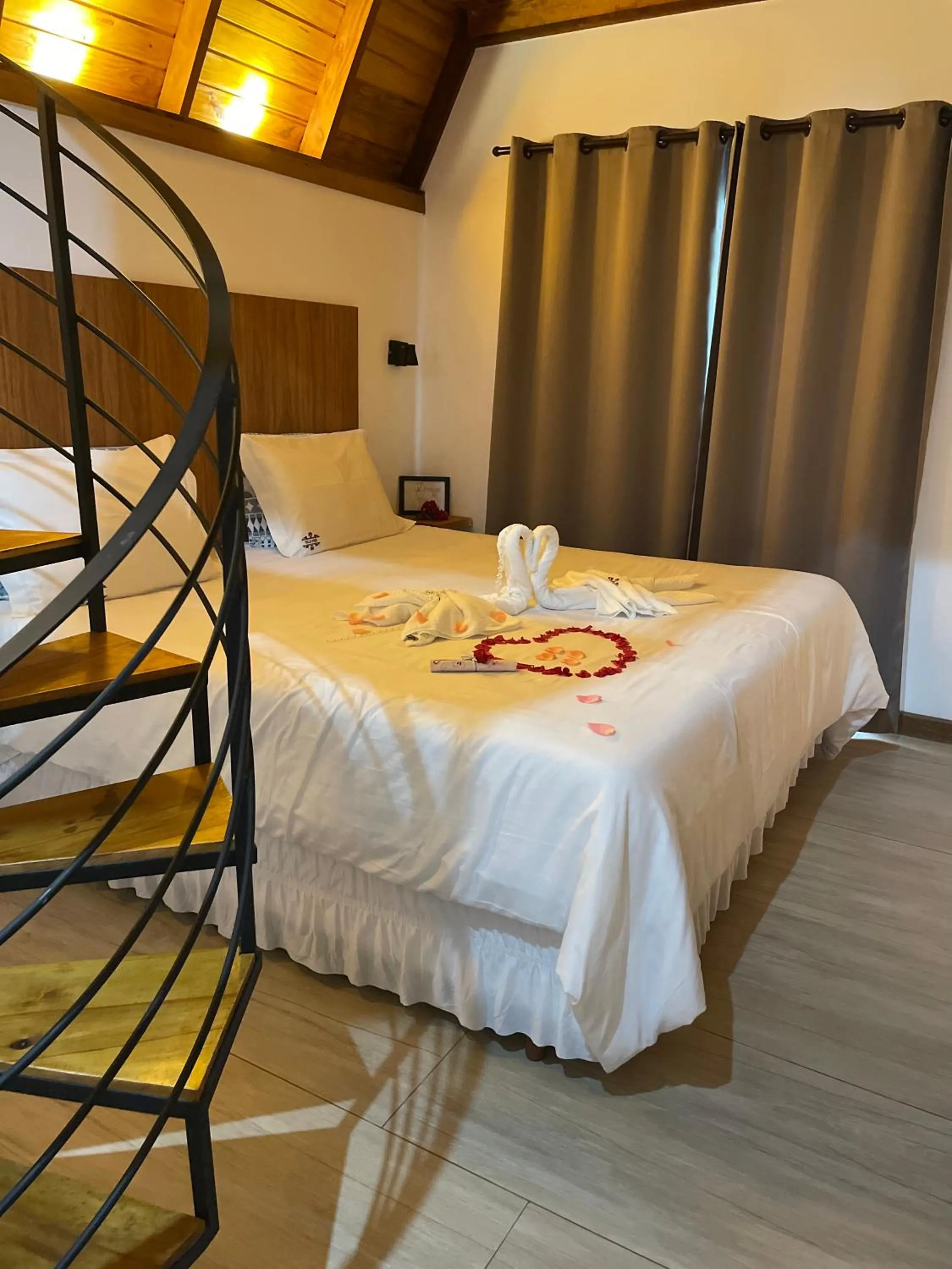 Bed in VILLA ITÁLIA CHALÉ