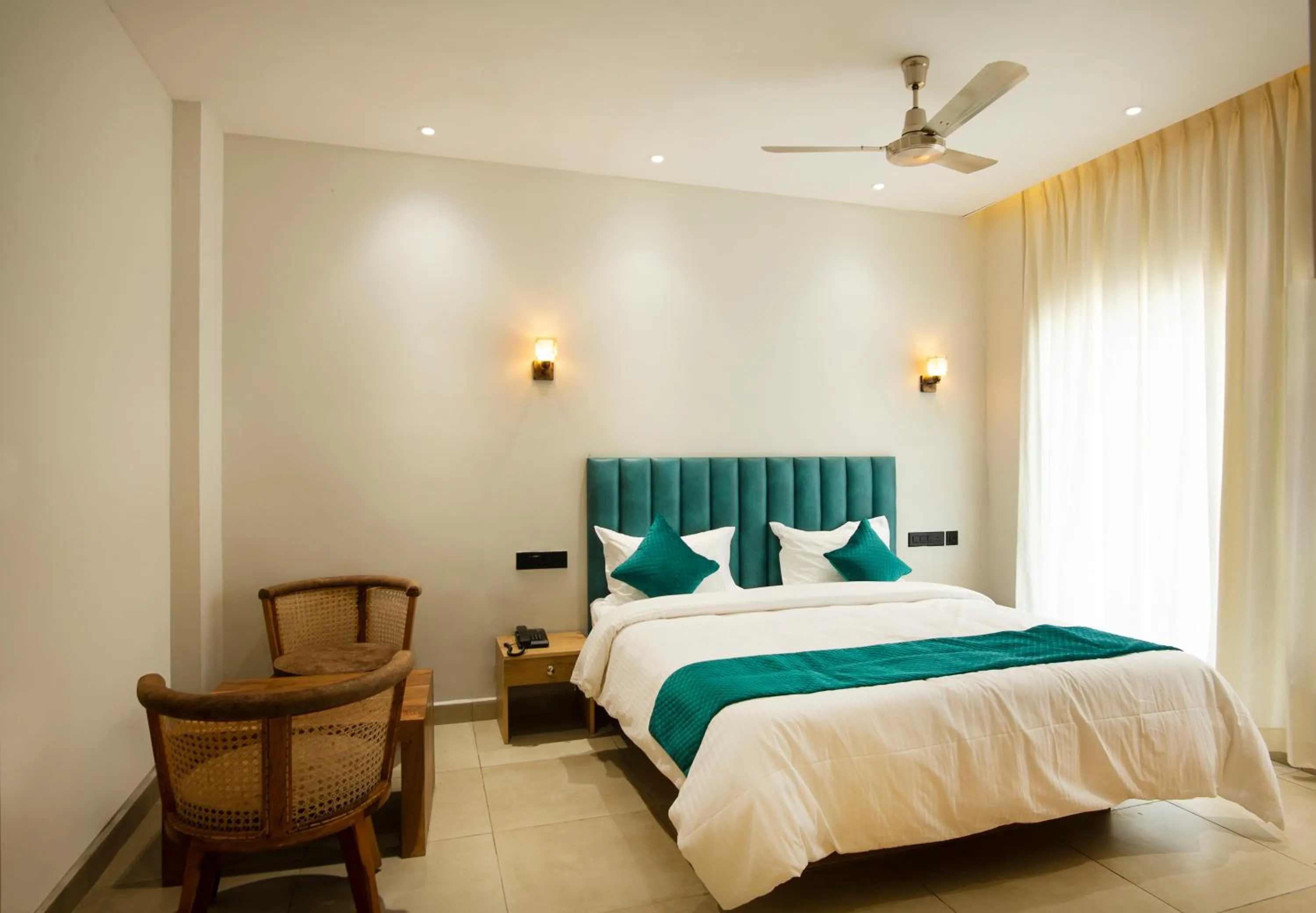 Photo of the whole room, Bed in The Coral Kanyakumari