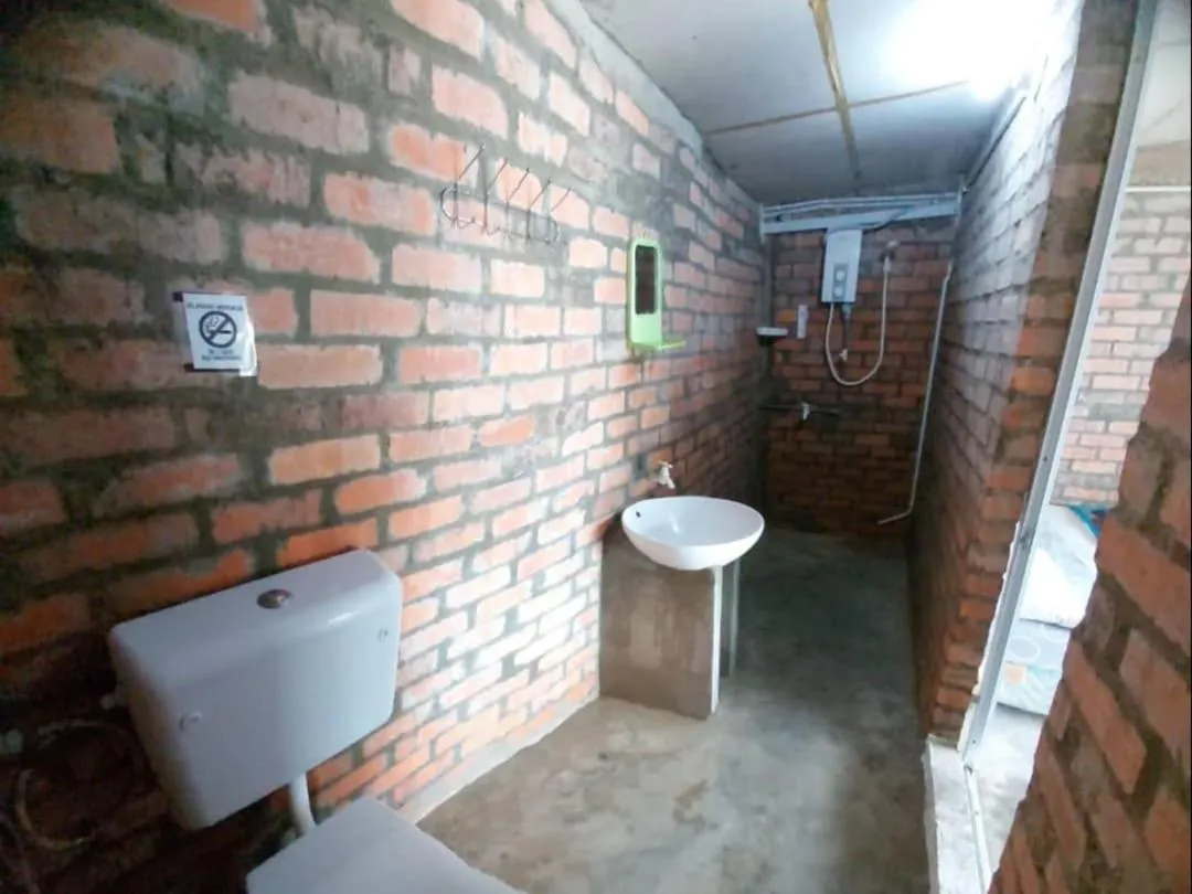 Bedroom in Hotel O Naga Puri Beach Retreat