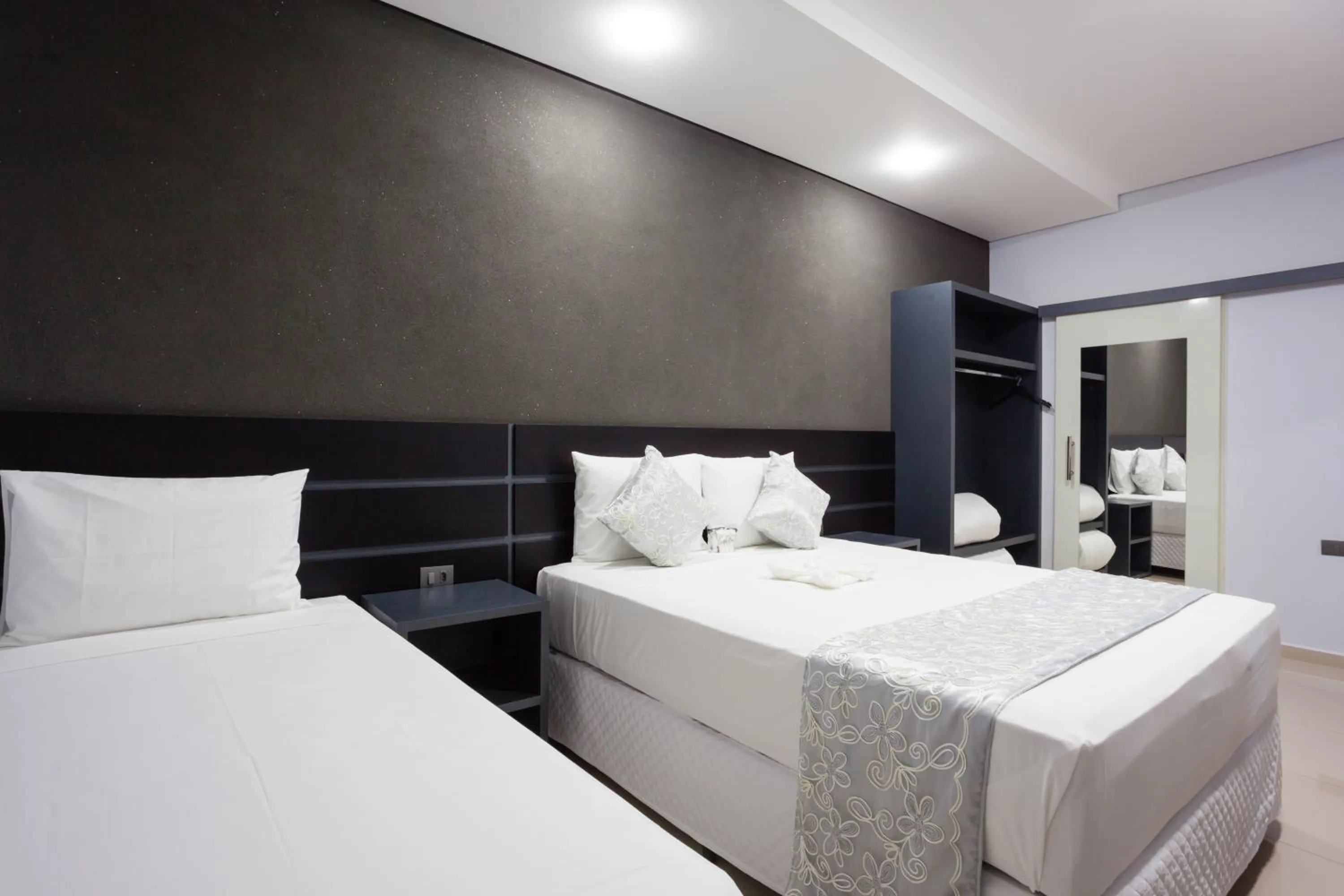 Bed in Sophita Business Hotel