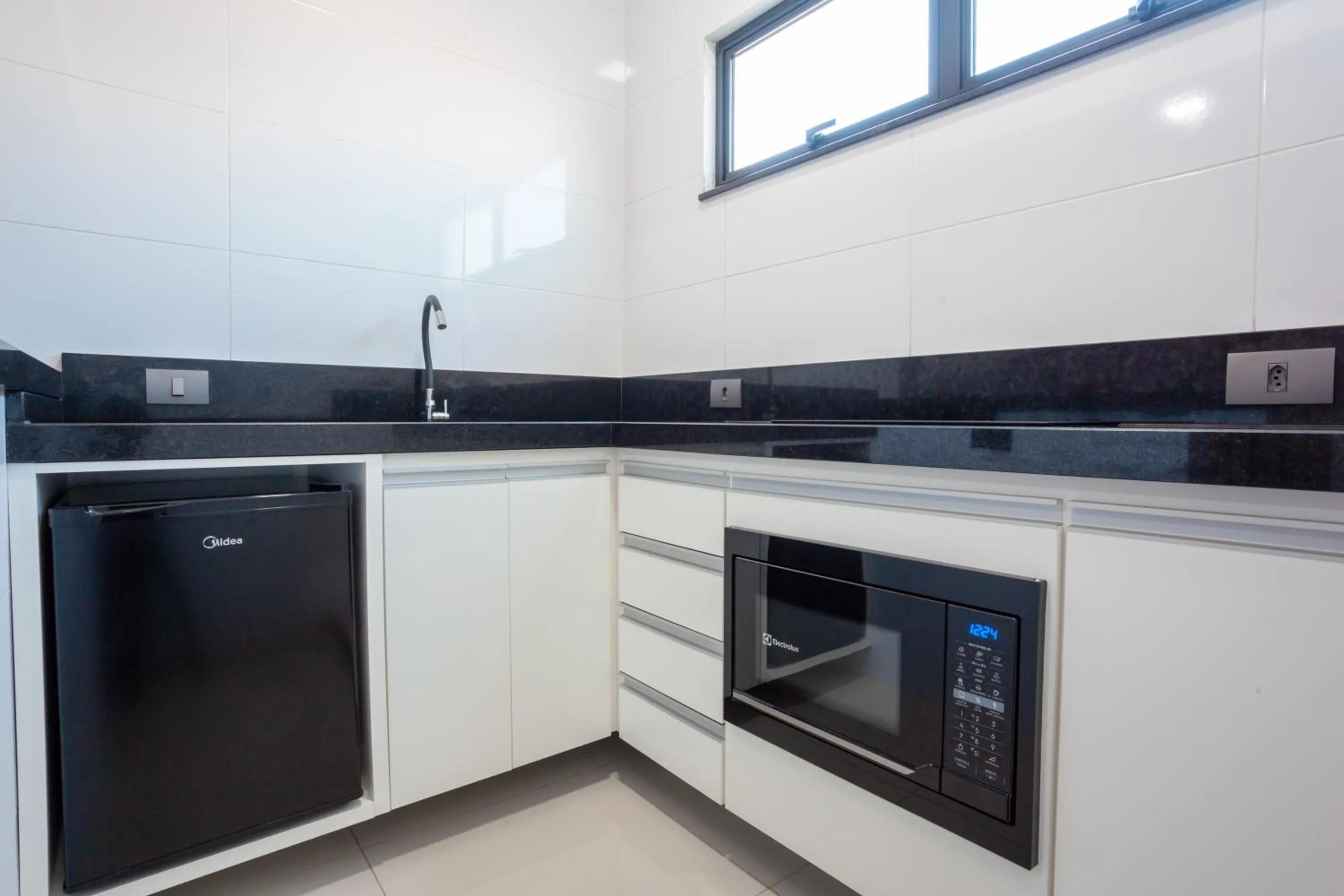 Kitchen or kitchenette in Sophita Business Hotel