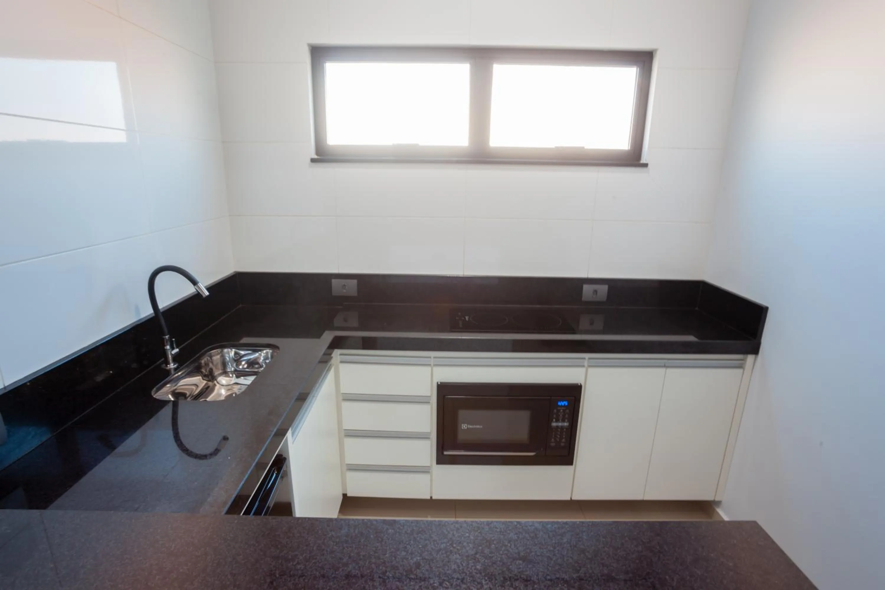 Kitchen or kitchenette in Sophita Business Hotel