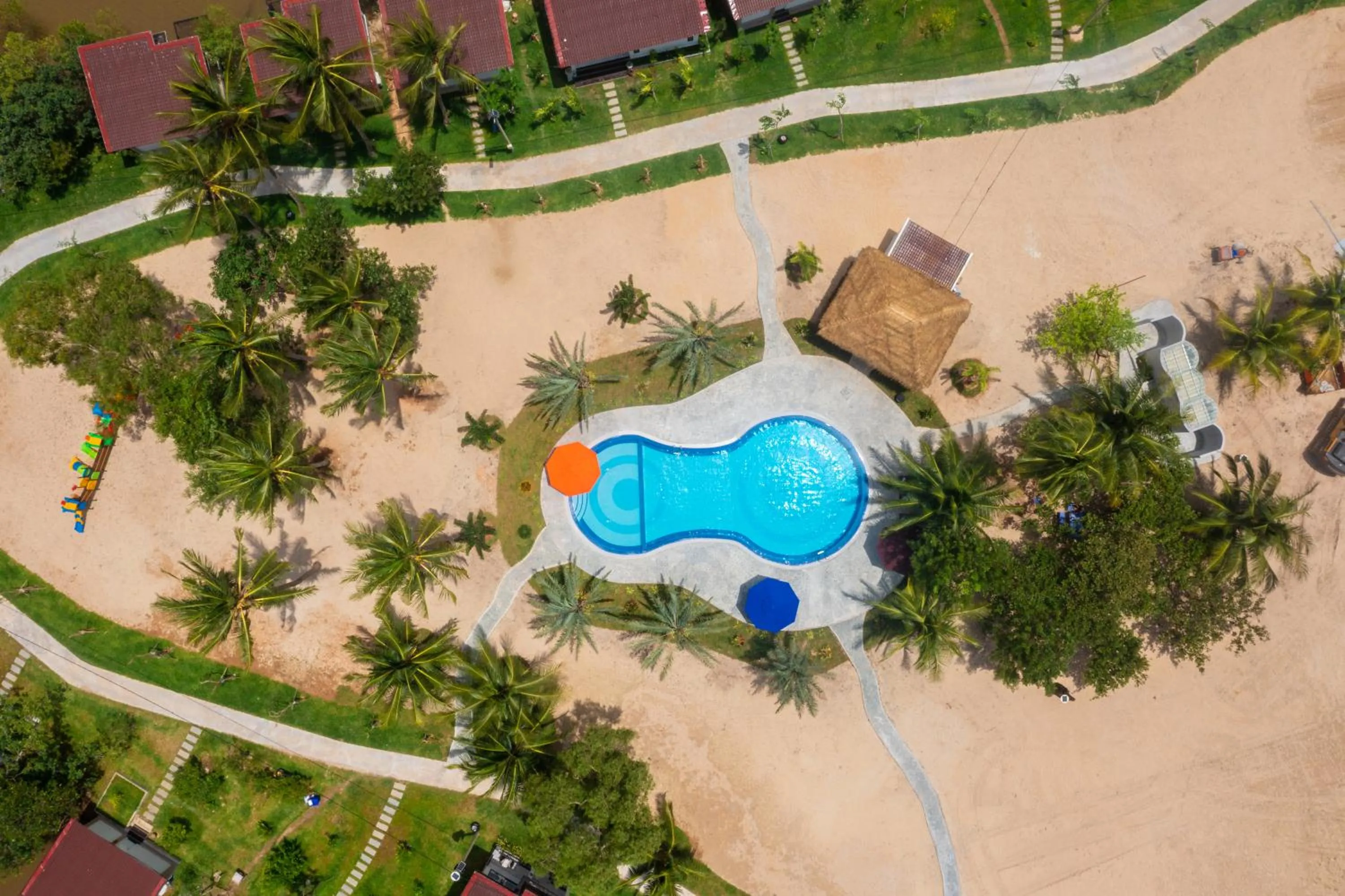 Swimming pool in SS Villa & Resort