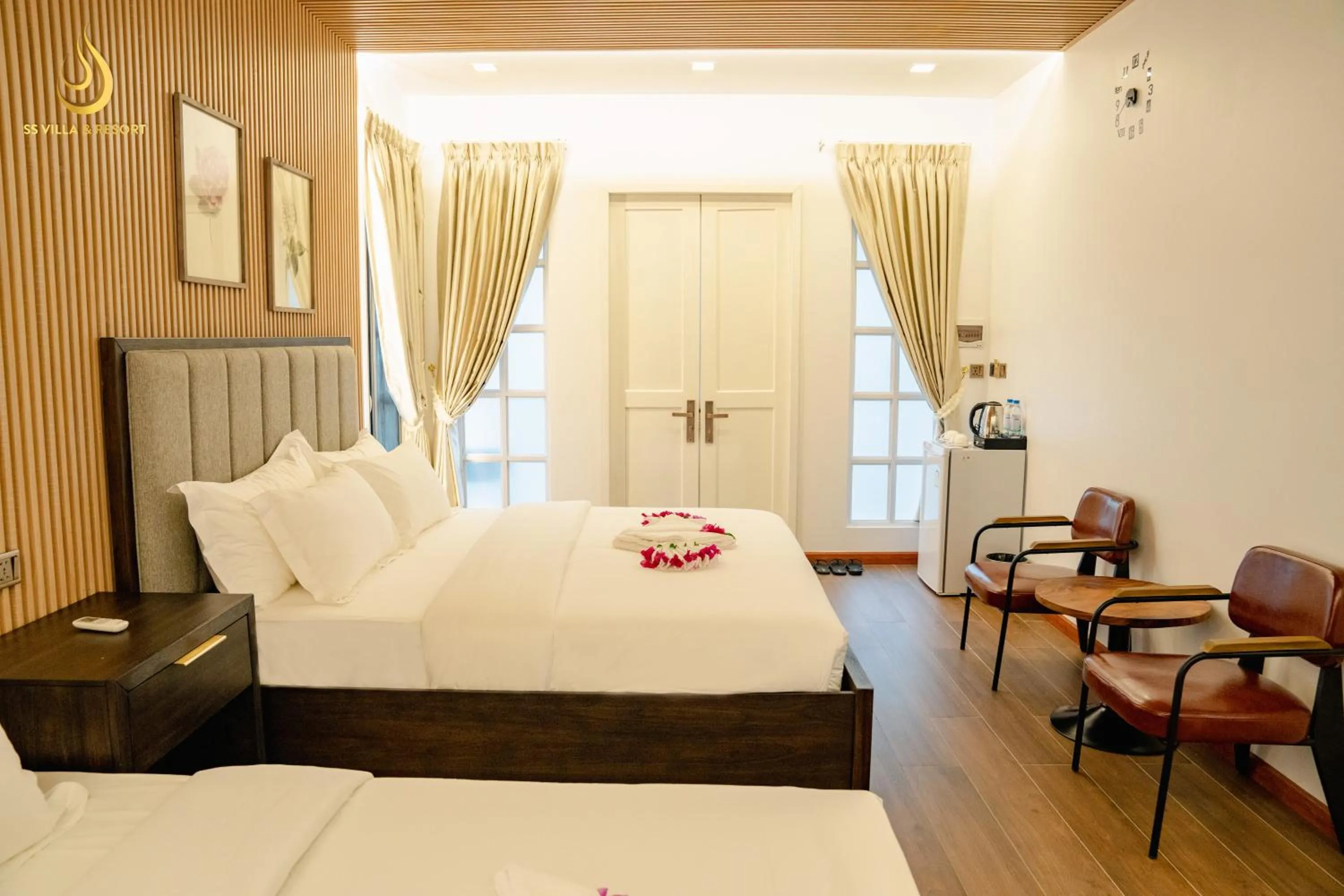 Bed in SS Villa & Resort