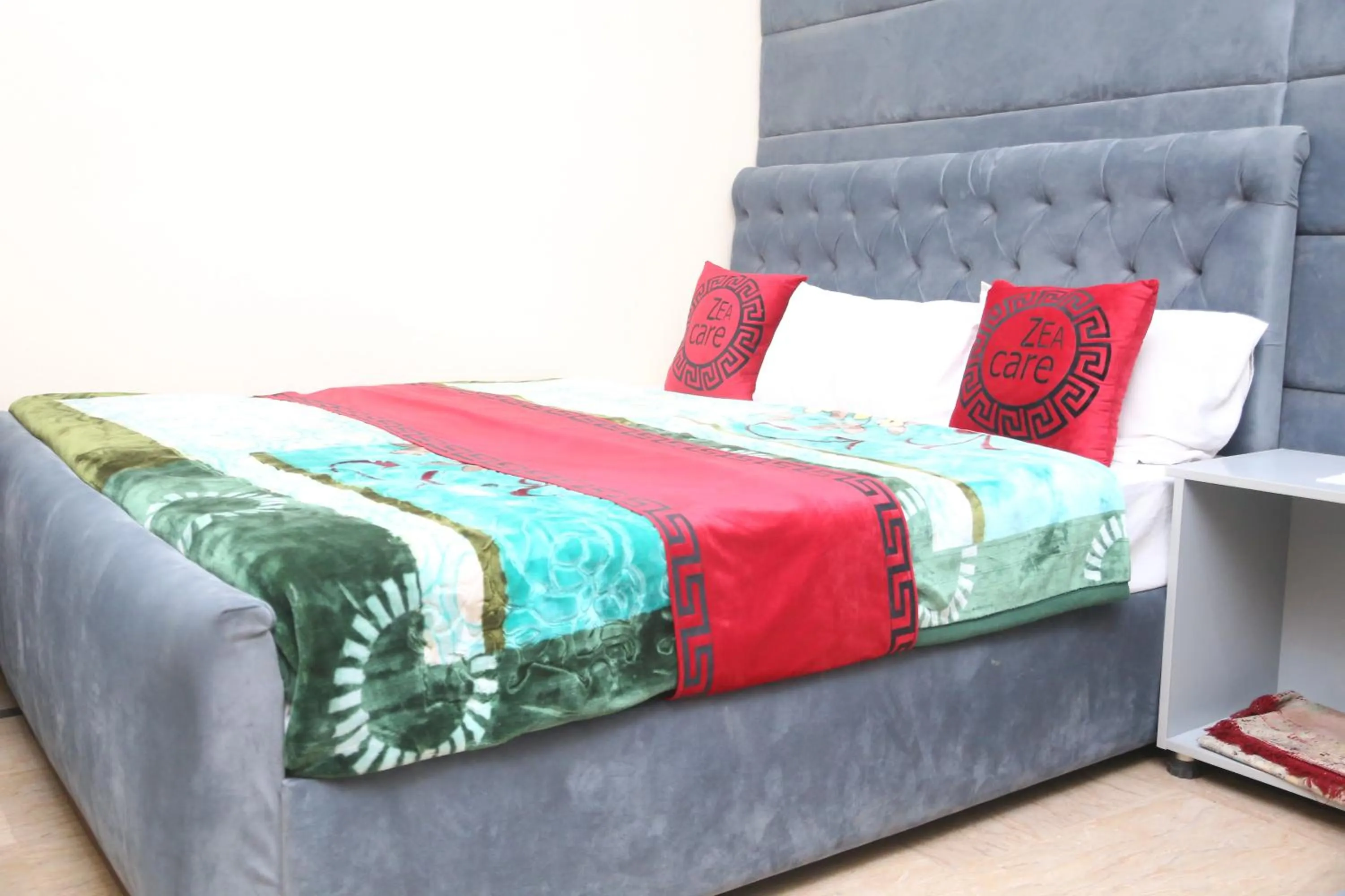 Living room, Bed in Hotel Zea Care Johar Town Lahore