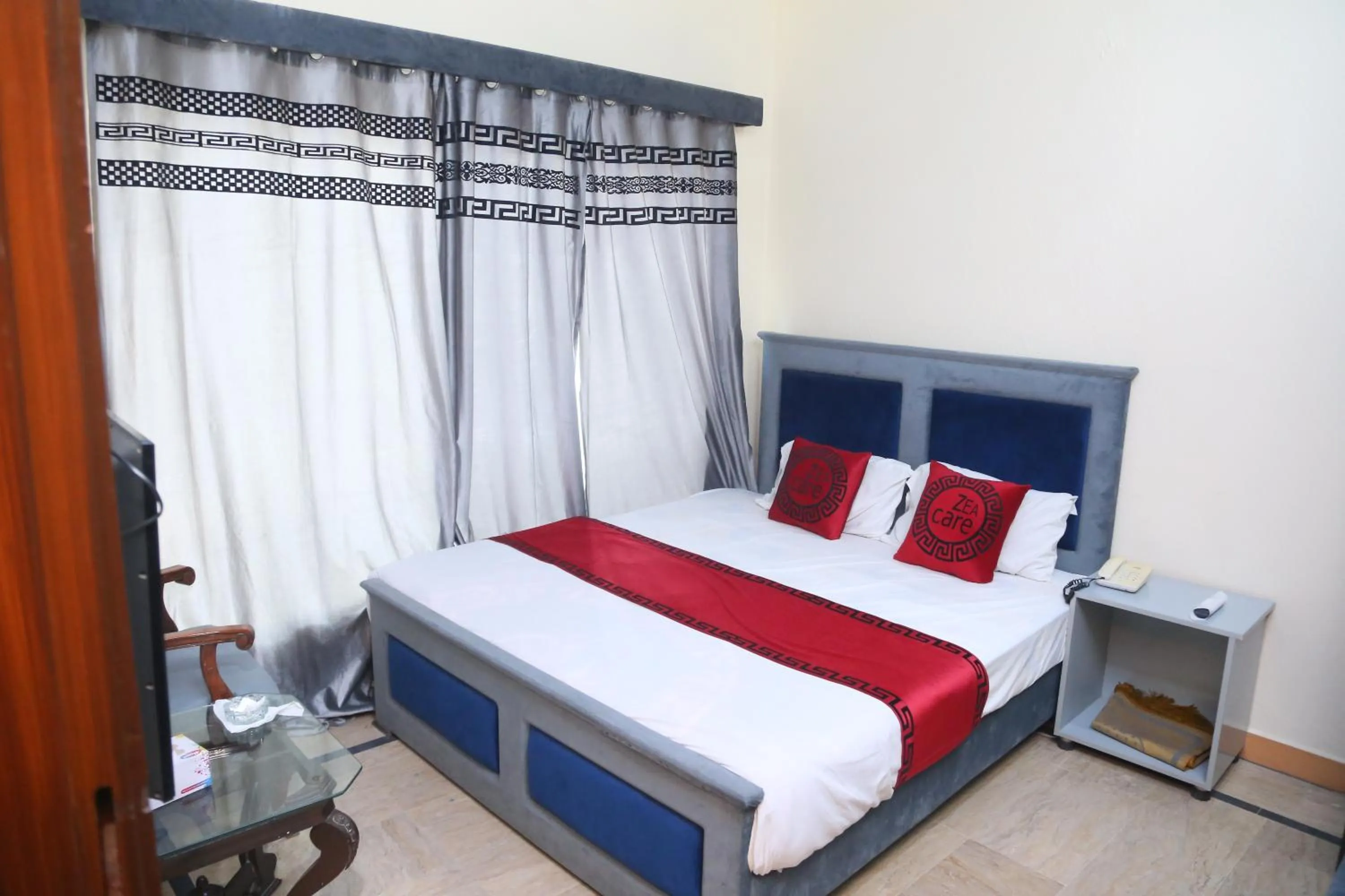 Bedroom, Bed in Hotel Zea Care Johar Town Lahore