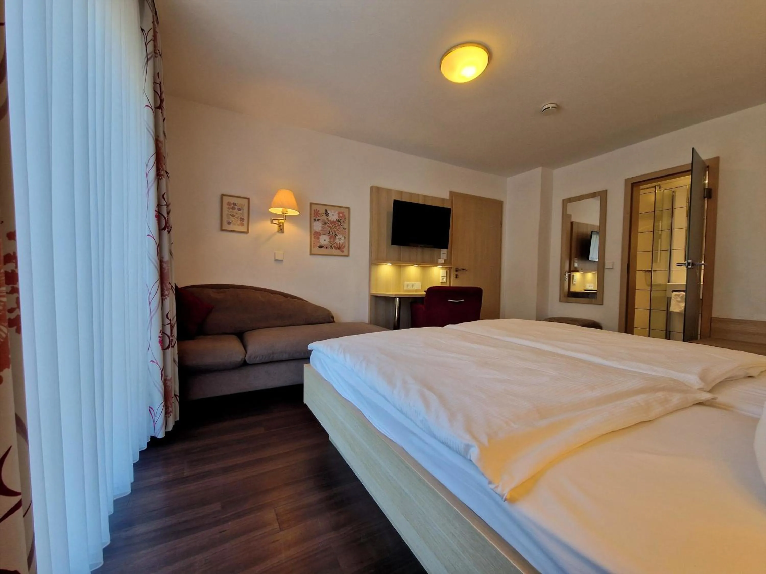 Bed in Blume Hausach I Hotel & Restaurant