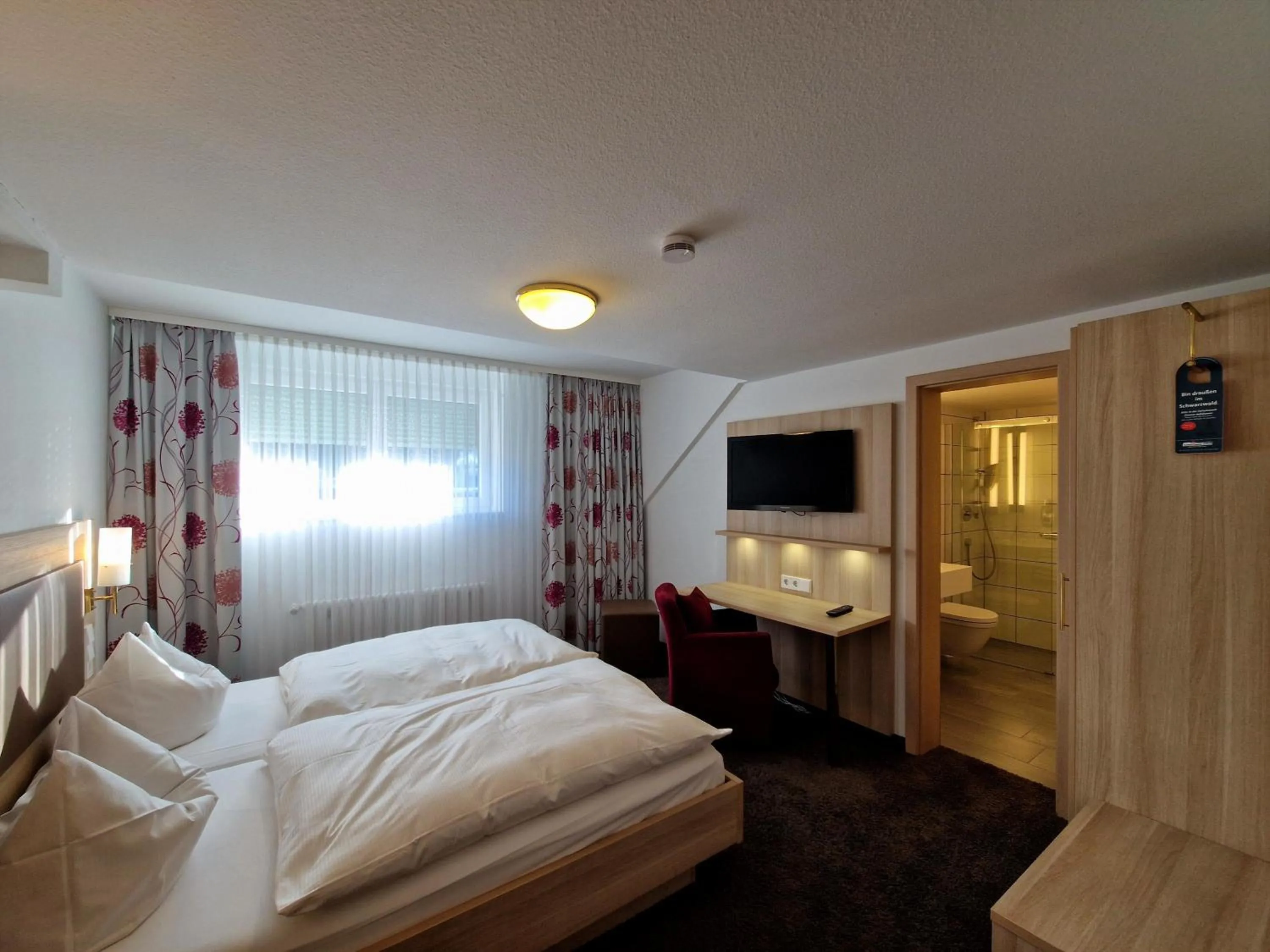 Bed in Blume Hausach I Hotel & Restaurant