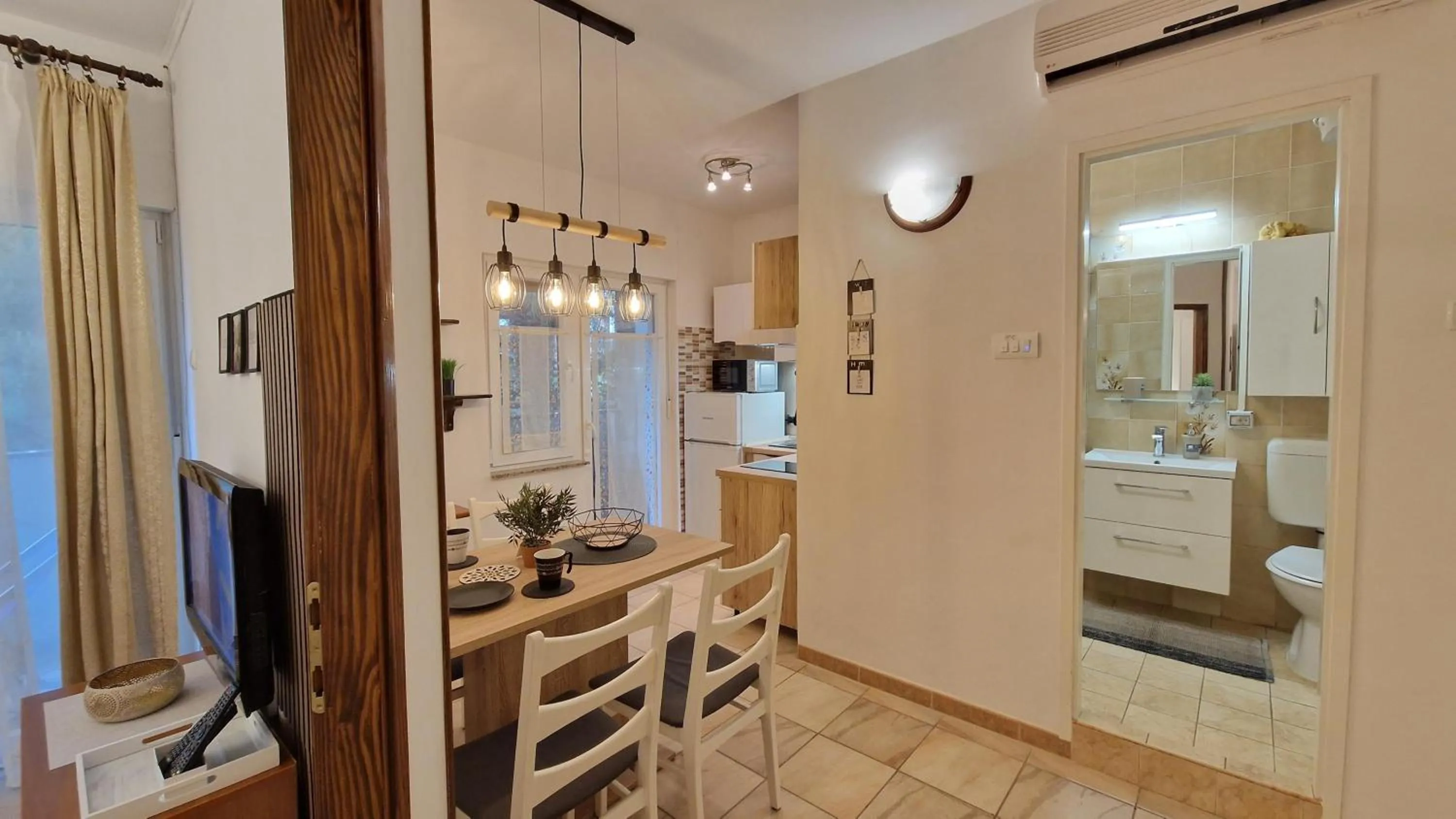 Kitchen or kitchenette in Apartments Godena