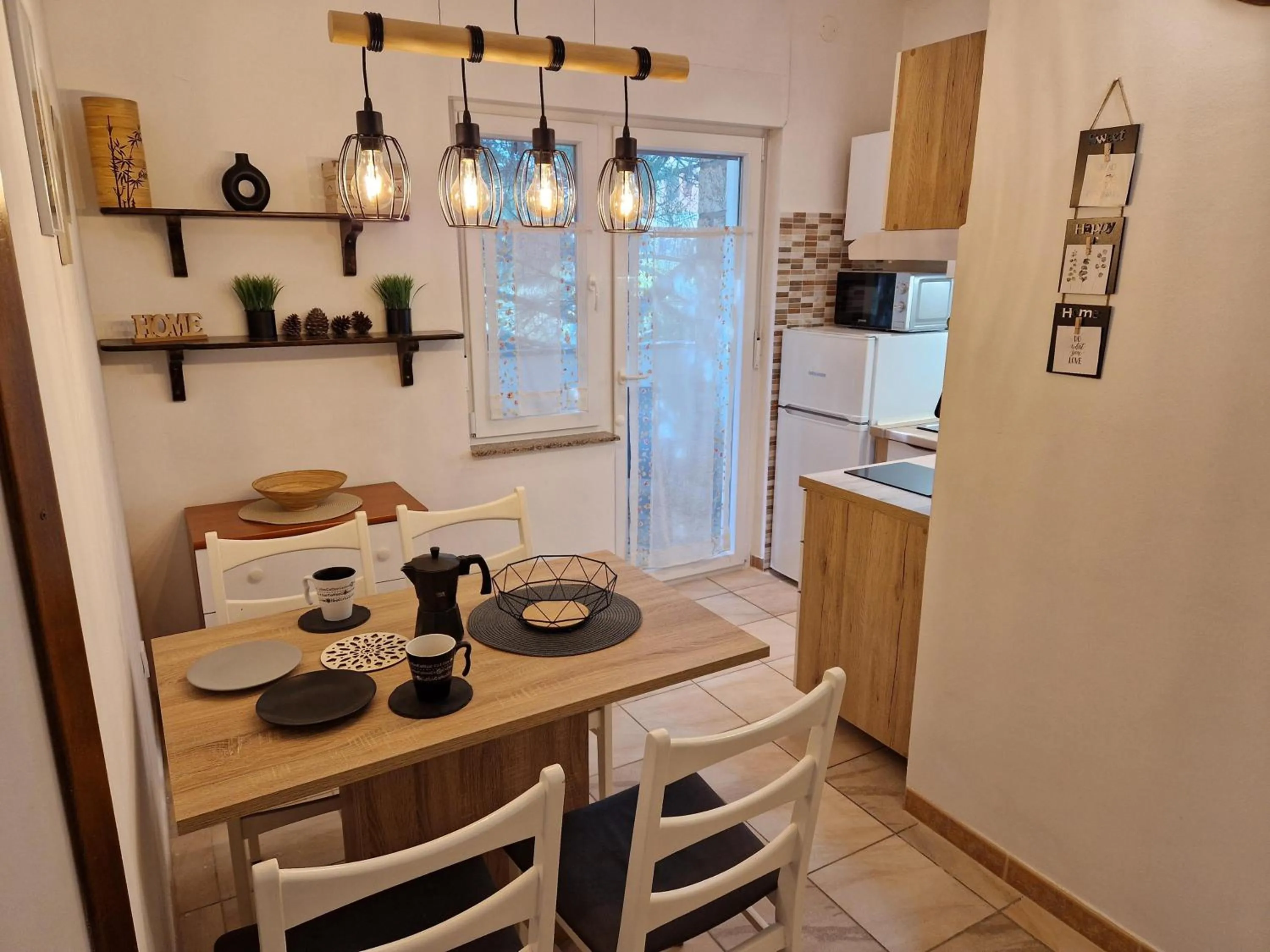 Kitchen or kitchenette in Apartments Godena